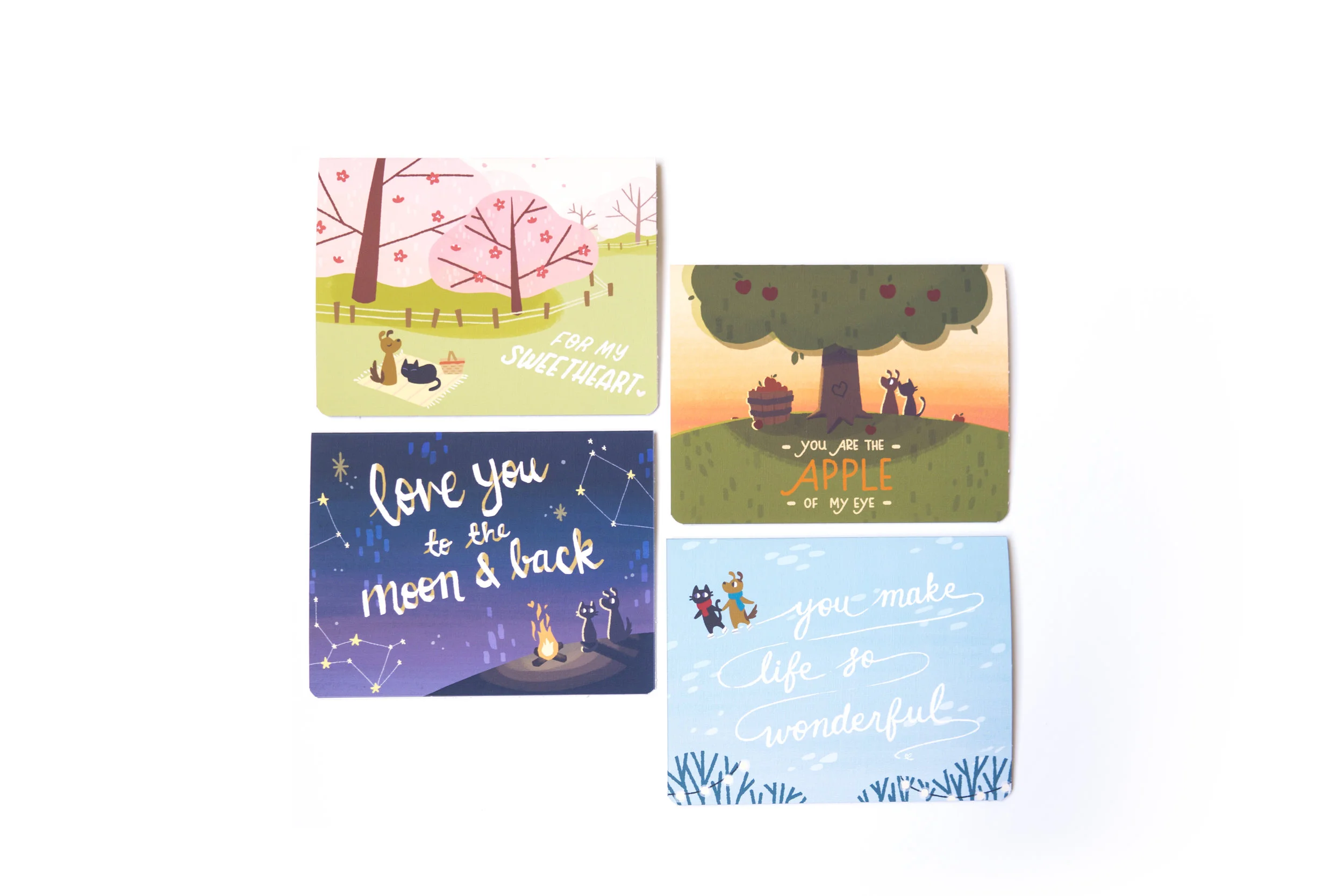 a set of four greeting cards