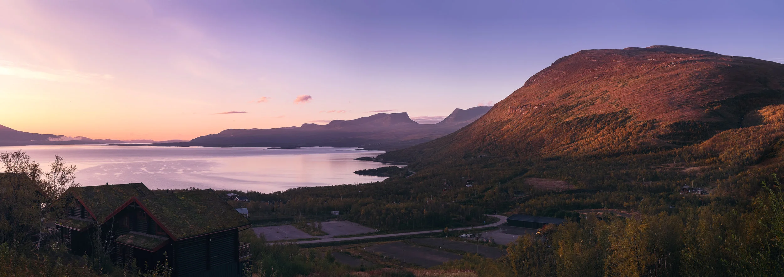 A sunrise view of the The Lapponian gate (Tjuonavagge) from the small village of Björkliden Sweden