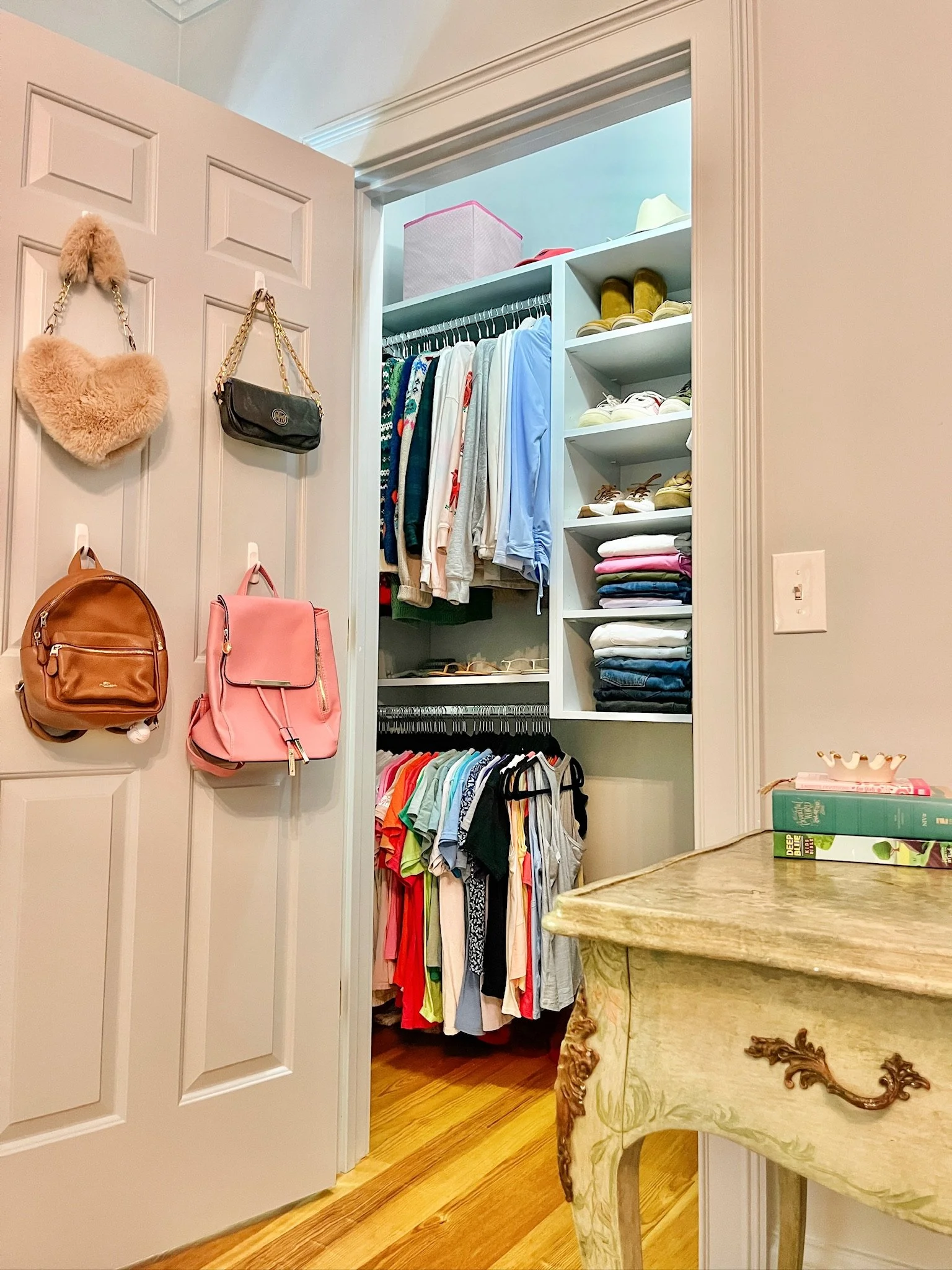  Medium Utility Command Hooks being used inside a child’s closet door for additional storage 