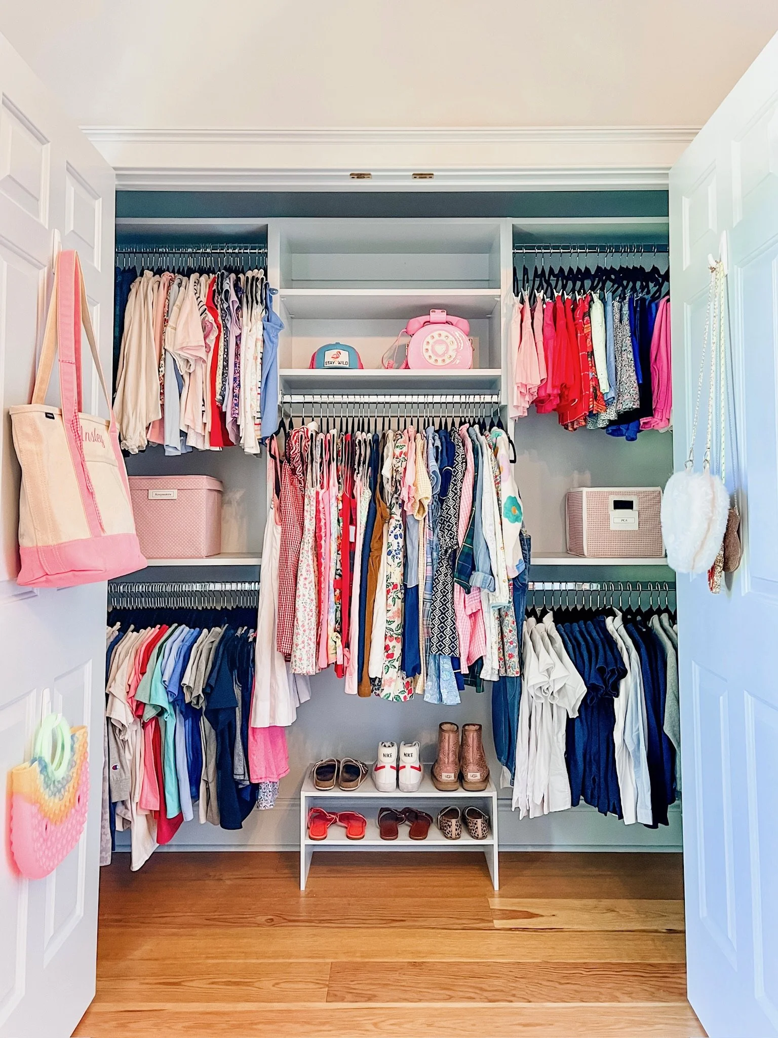  Medium hooks on back of door for extra accessory storage 