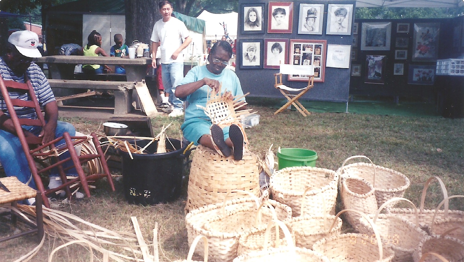 Estelle's parents, Sterling and Mary Ella giving a weaving demonstration in the early 1990s