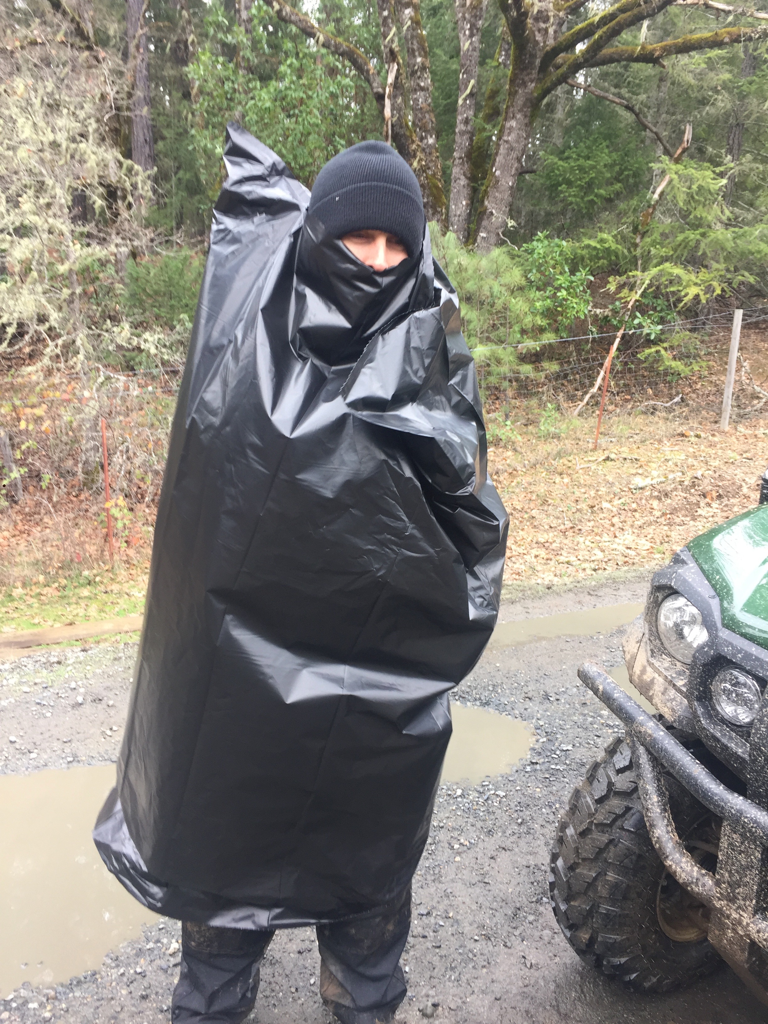 So anyway this homeless guy walked on the property dressed in a garbage bag-- well you can imagine--I wondered what institution he escaped from! It is, of course, Mr Ryan Cooper, Farmer Extraordinaire, The Culvert Rat, The Bag Guy, Vineyard Pest, et al!