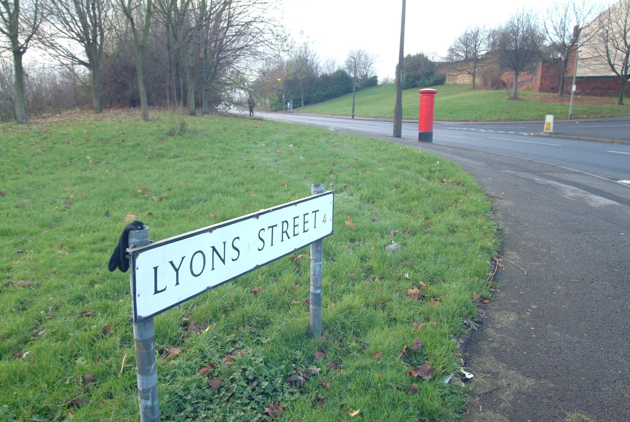 My home town. Sadly, or maybe for the better, the old district of Pitsmoor no longer exists as I knew it growing up. The above photo is the street I grew up on. The street sign is new-- the post box is the original one.