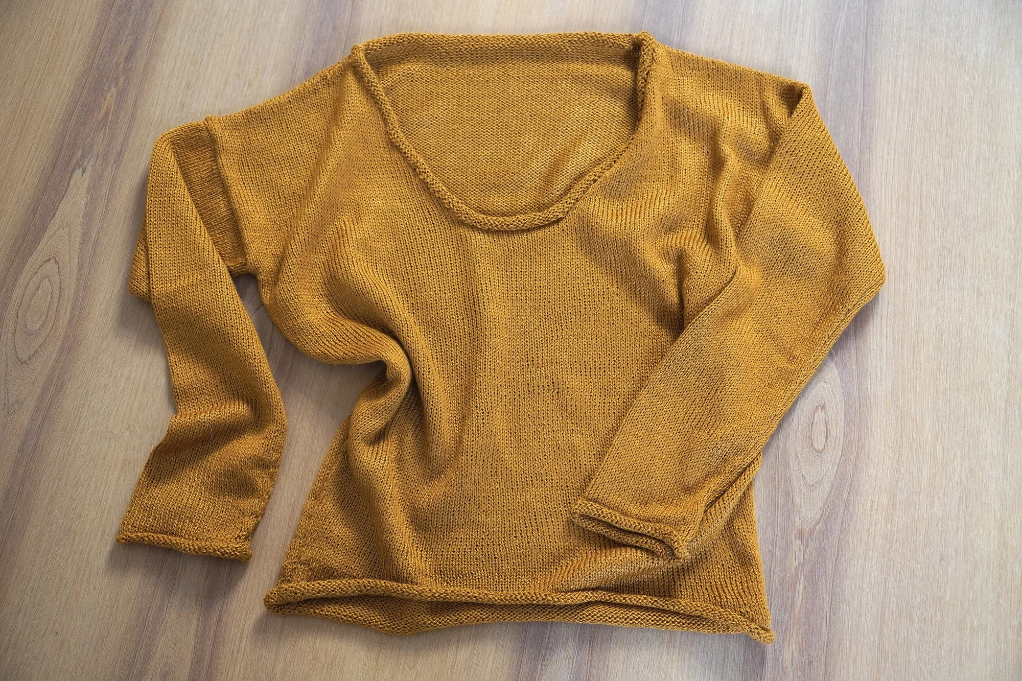 Q05.U-NECK-SWEATER—AW26-Ochre.02.jpg