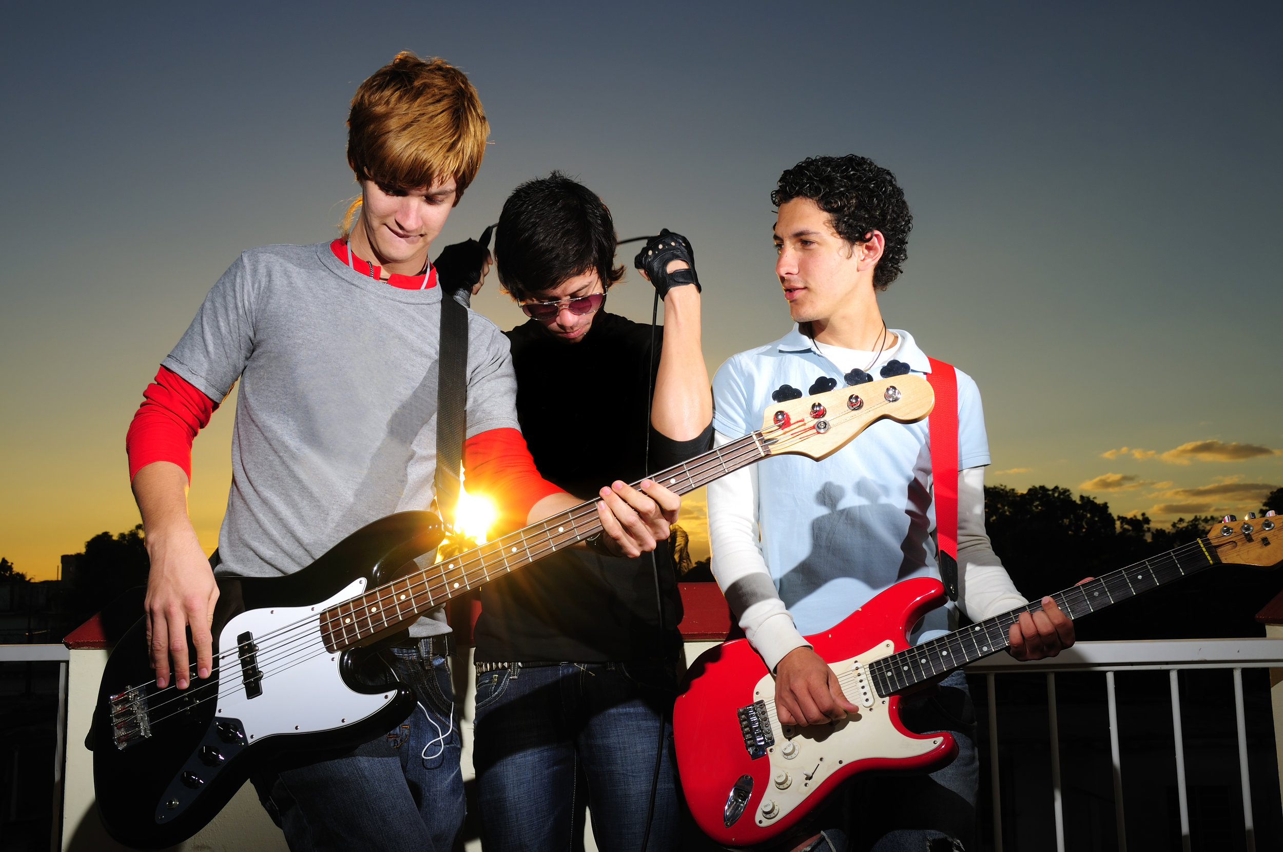 Young musicians posing with instruments