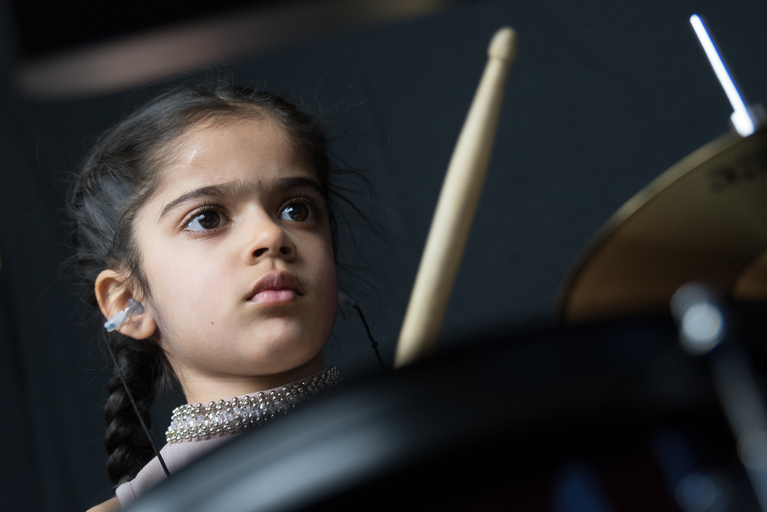 Girl practicing the drums