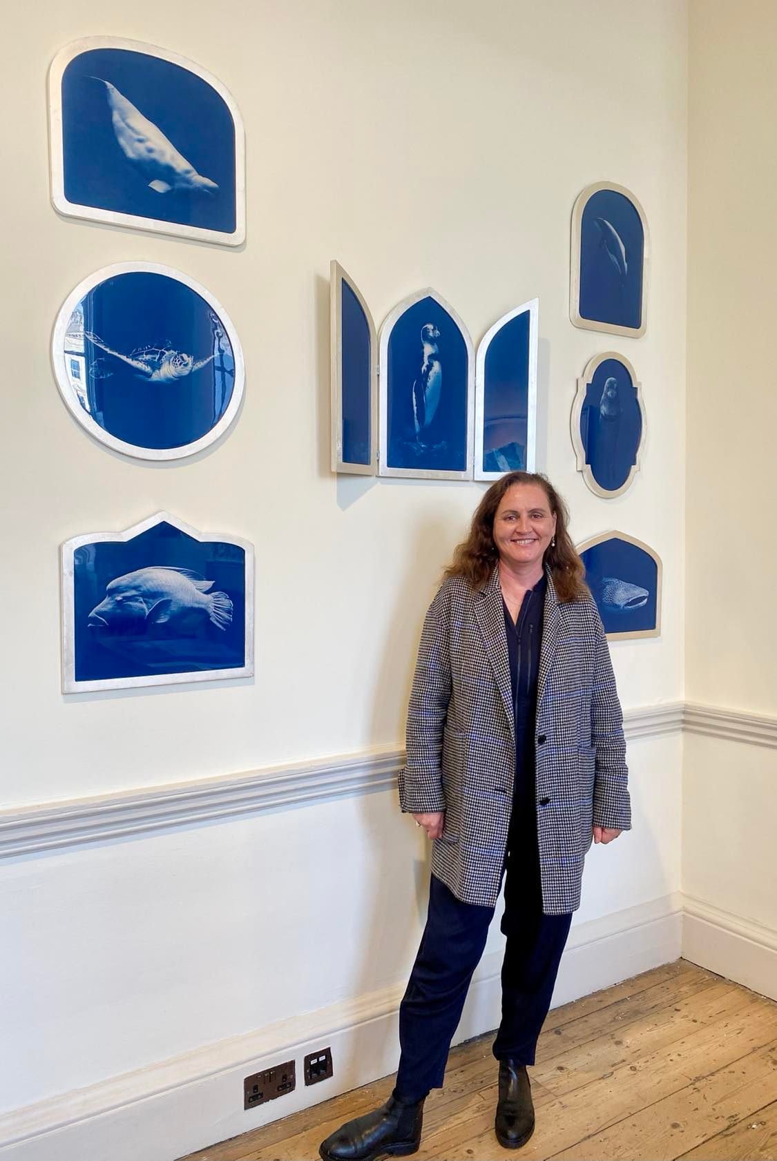 Inga at photo london  2022 in front of Icons of the ocean.jpeg