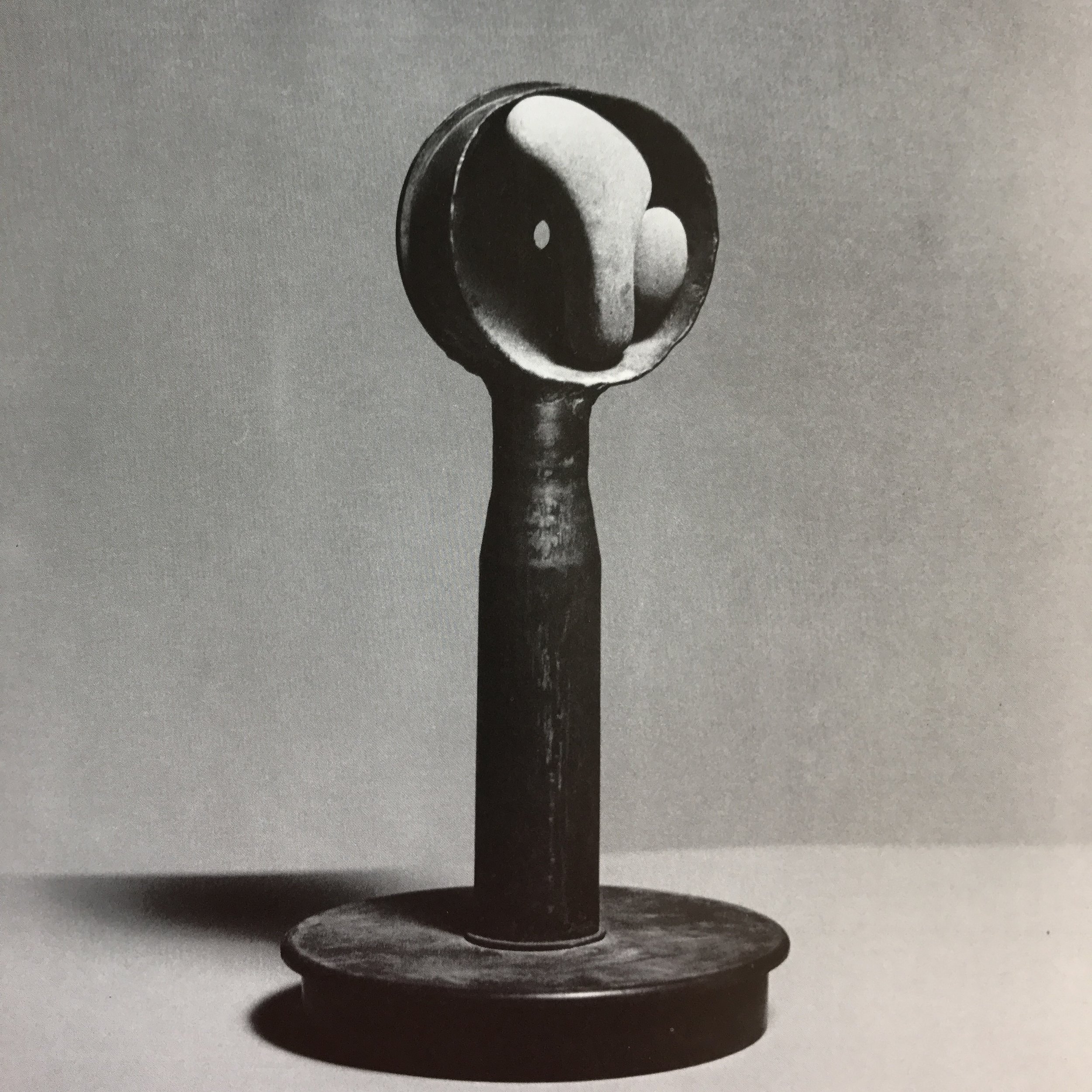 Shellman / Year: 1971 / Material(s): Brass, artillary shells and riverstones 