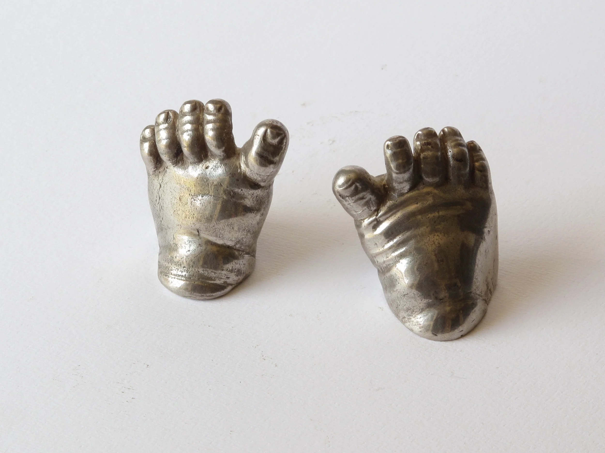 Title: Babies Feet / Year: 1999 / Material: Cast sterling silver