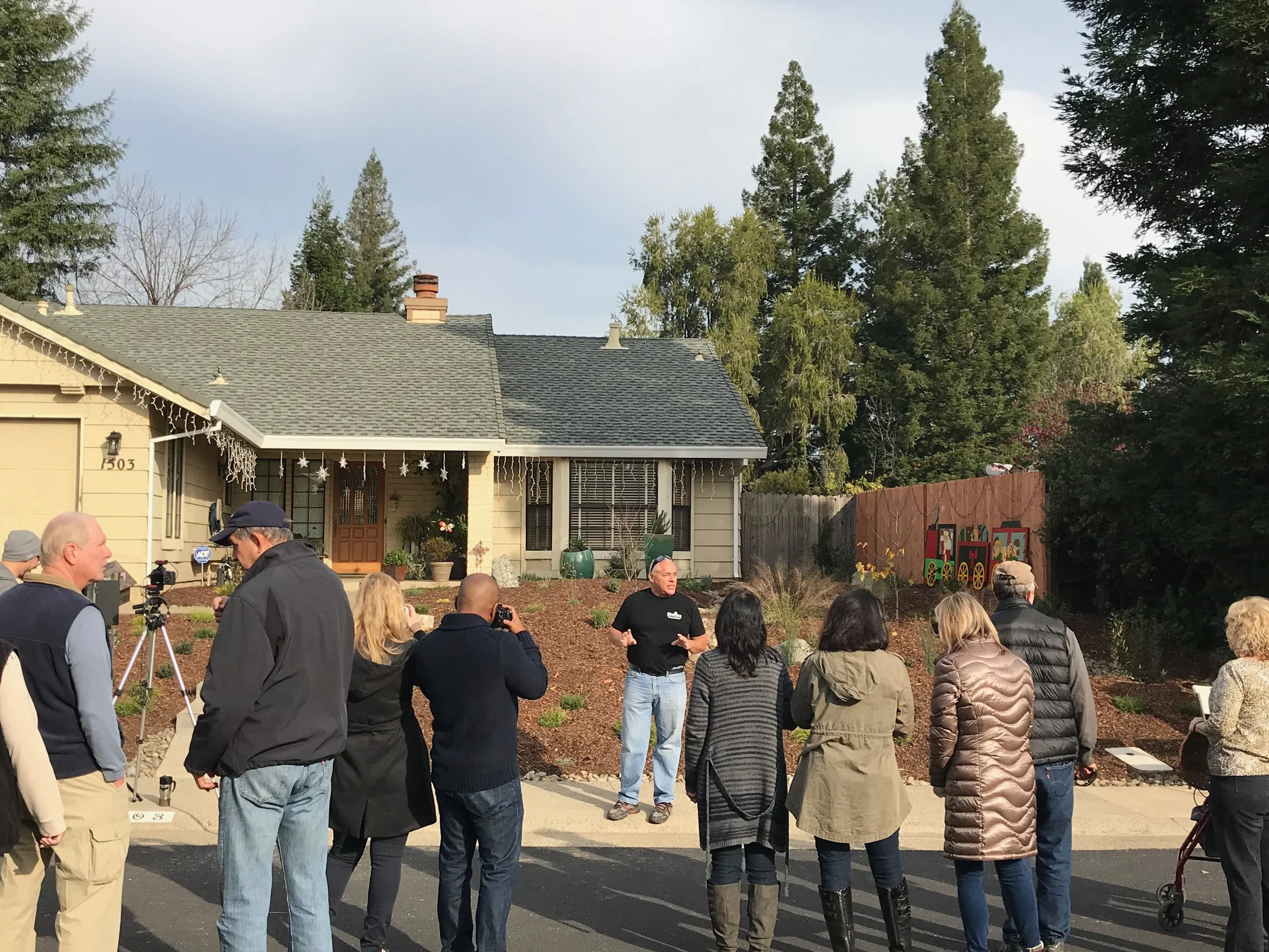 Neighbors celebrate the Nelson’s new garden.