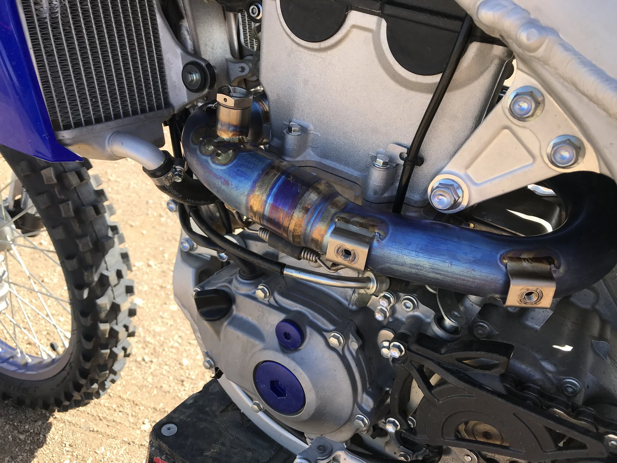The Akrapovic accepts the use of Yamaha's stock heat shields.