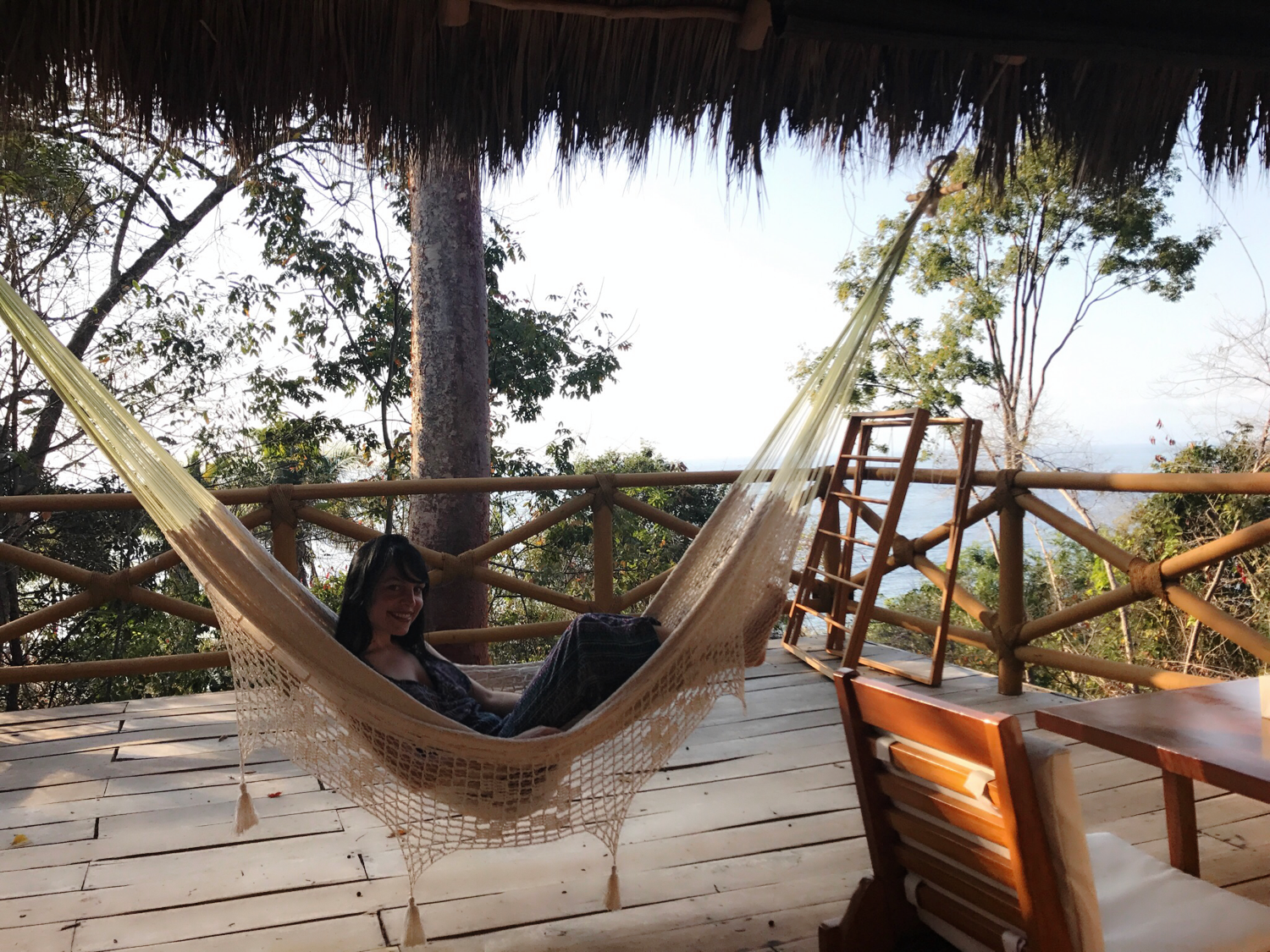  Colleen lounging on the hammock in our Small Palapa's terrace. 