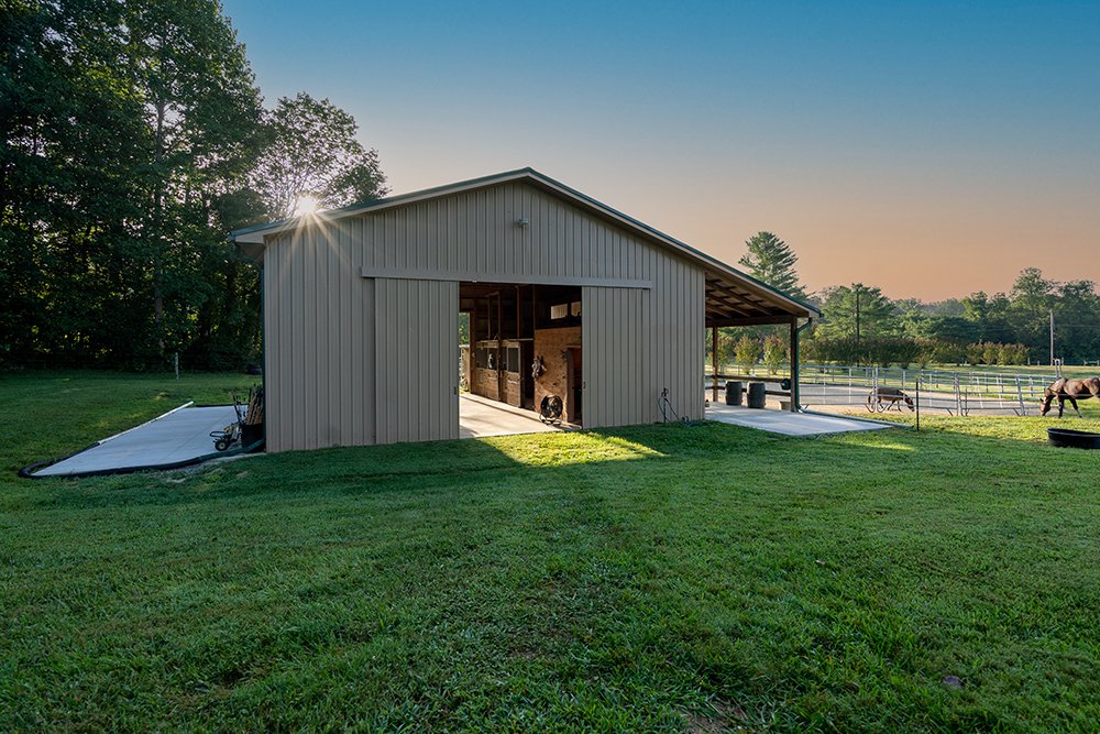 Don Evans Photography in Greensboro NC Real Estate Photography sunrise shot of a horse barn on a large farm