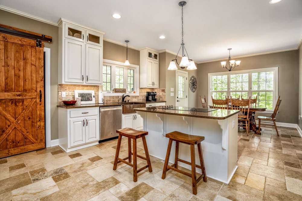 Don Evans Photography in Greensboro NC Real Estate Photography shot of a kitchen in a large property house