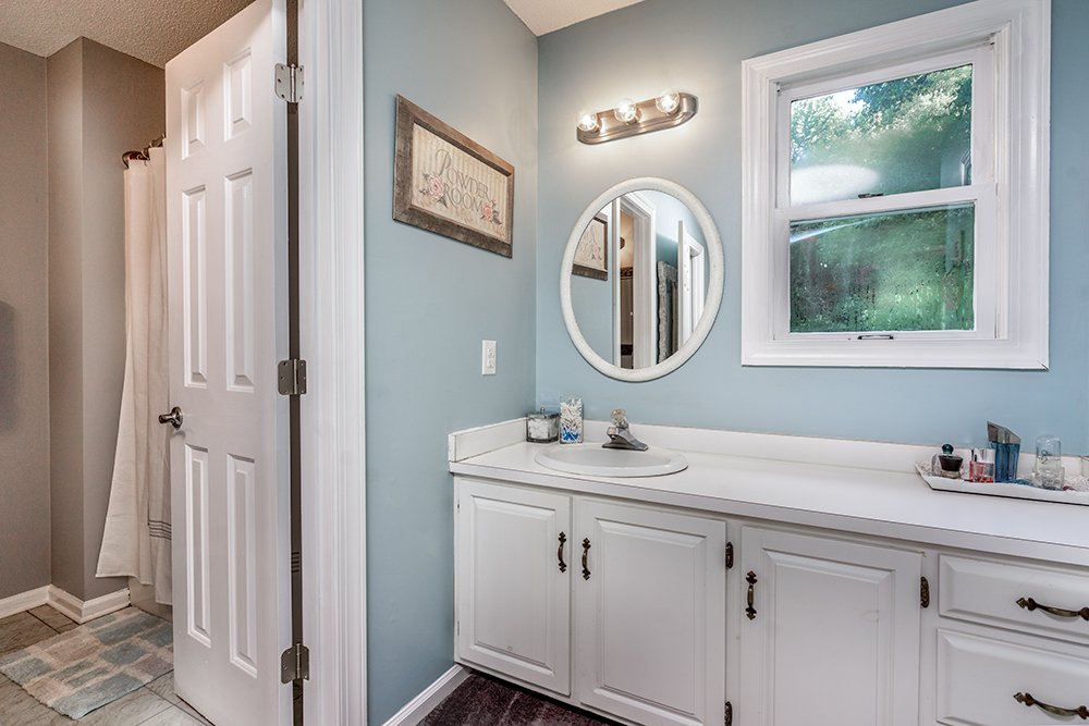 Don Evans Photography in Greensboro NC Real Estate Photography shot of a bathroom and sink area