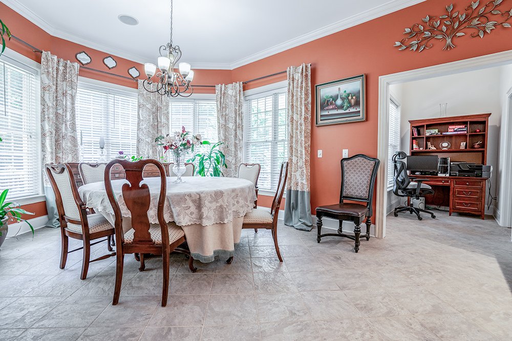 Don Evans Photography in Greensboro NC Real Estate Photography shot of a dining area in a large home