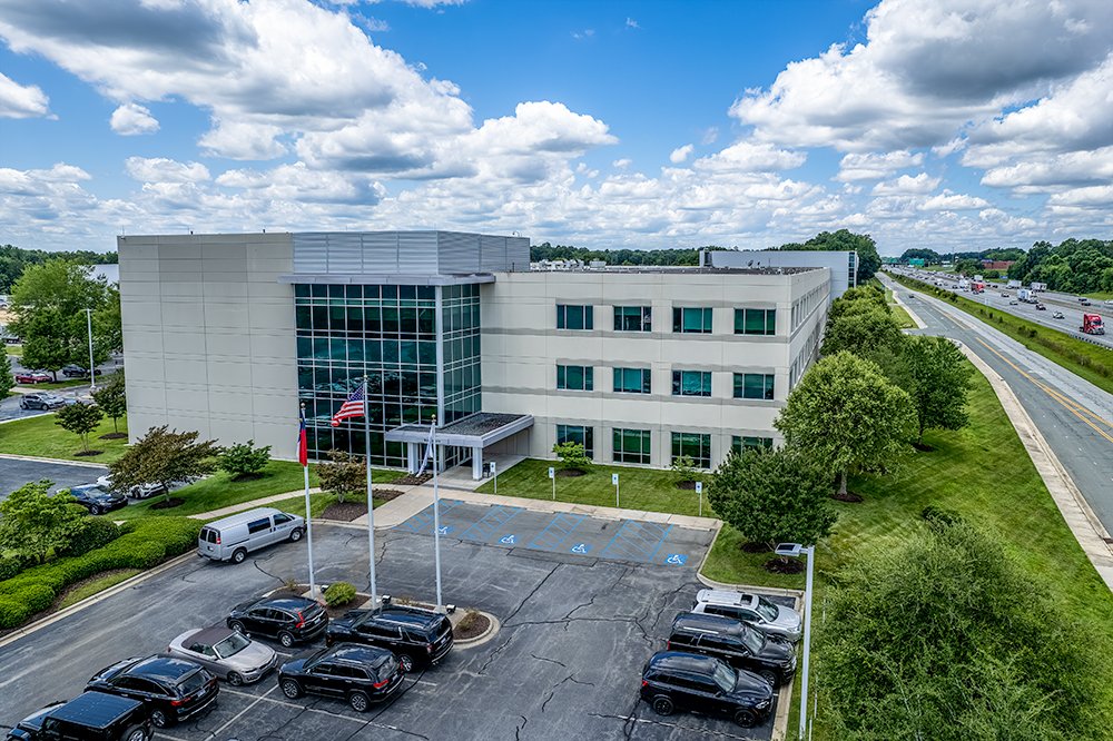 Don Evans Photography in Greensboro NC Real Estate Photography aerial drone view of a large office building during their commercial property photo session