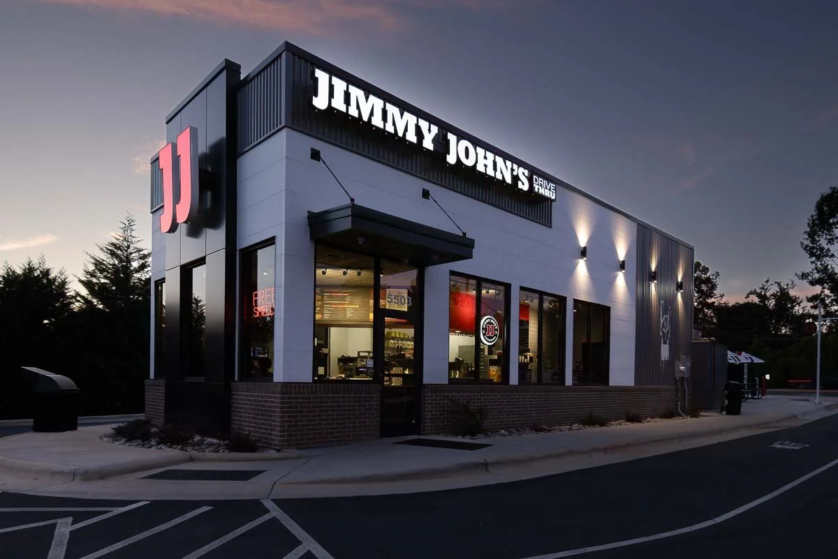 Commercial real estate photography of Jimmy John's restaurant exterior at dusk, Greensboro NC - Professional Commercial Media