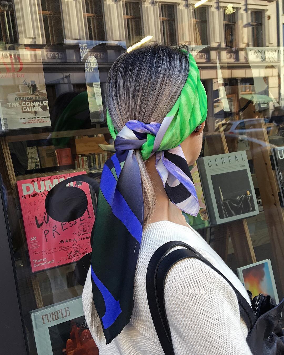 digital printed silk scarf Aurora as seen outside of @doyoureadme_berlin 
This hand rolled hem 100% silk scarf features a contemporary graphic aesthetic design in a fresh colour combo of neon green, light purple, gradience navy and gradience dark gre