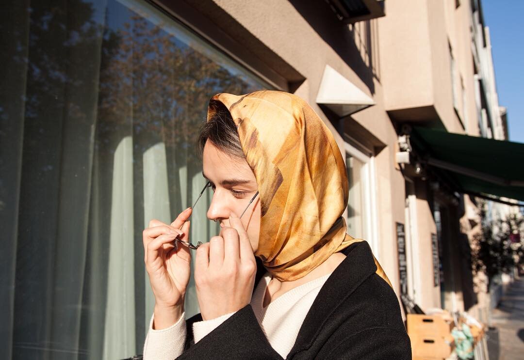 silk scarf Golden Birch as seen on #berlin #street in #autumn . It took us half a year to fine-tune this subtle golden shade which took inspiration from the surface texture of birch wood furnitures. Visit link in bio to find out more.  #scarf #scarve