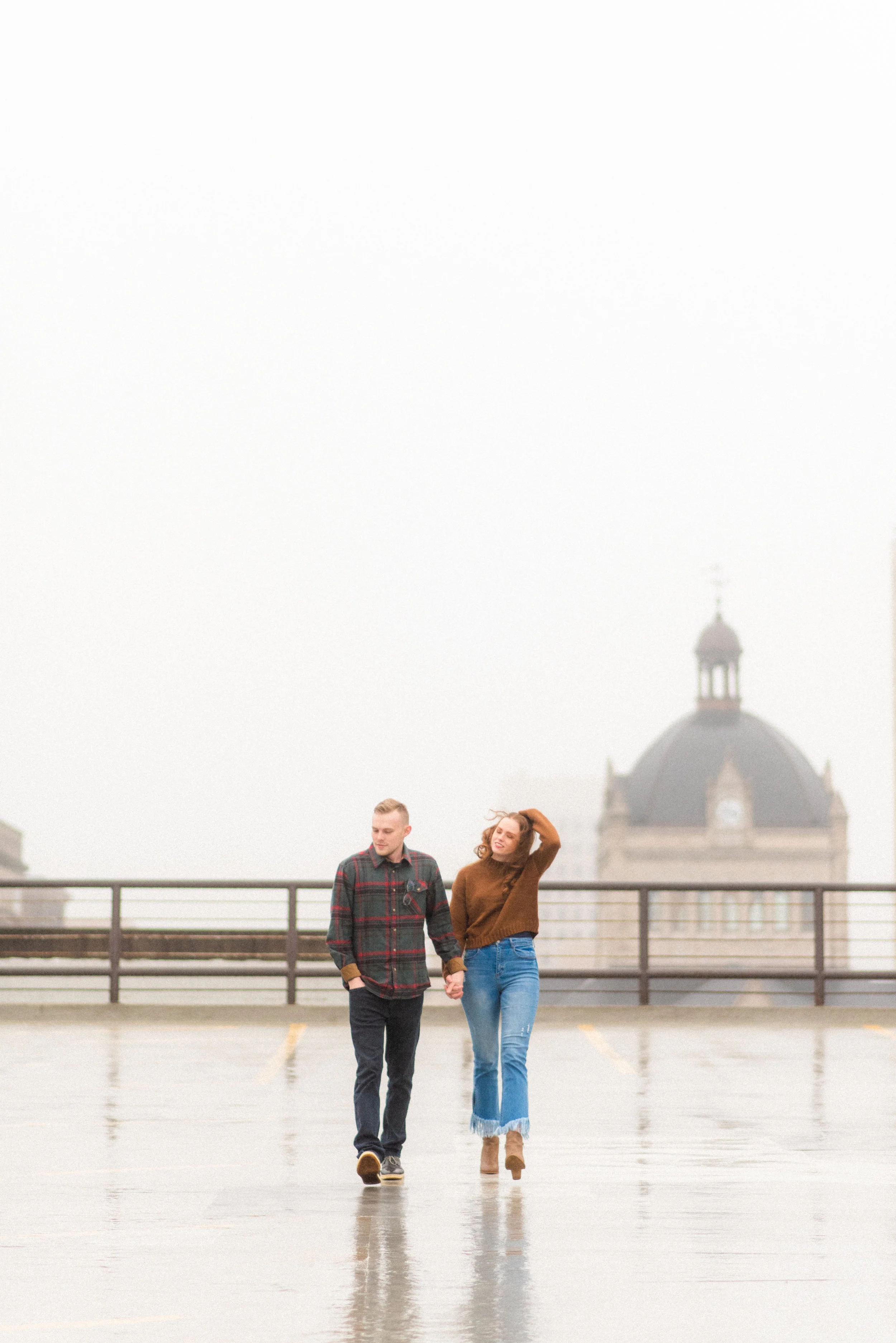 Paige + Ryan: They make walking through the rain look graceful.
