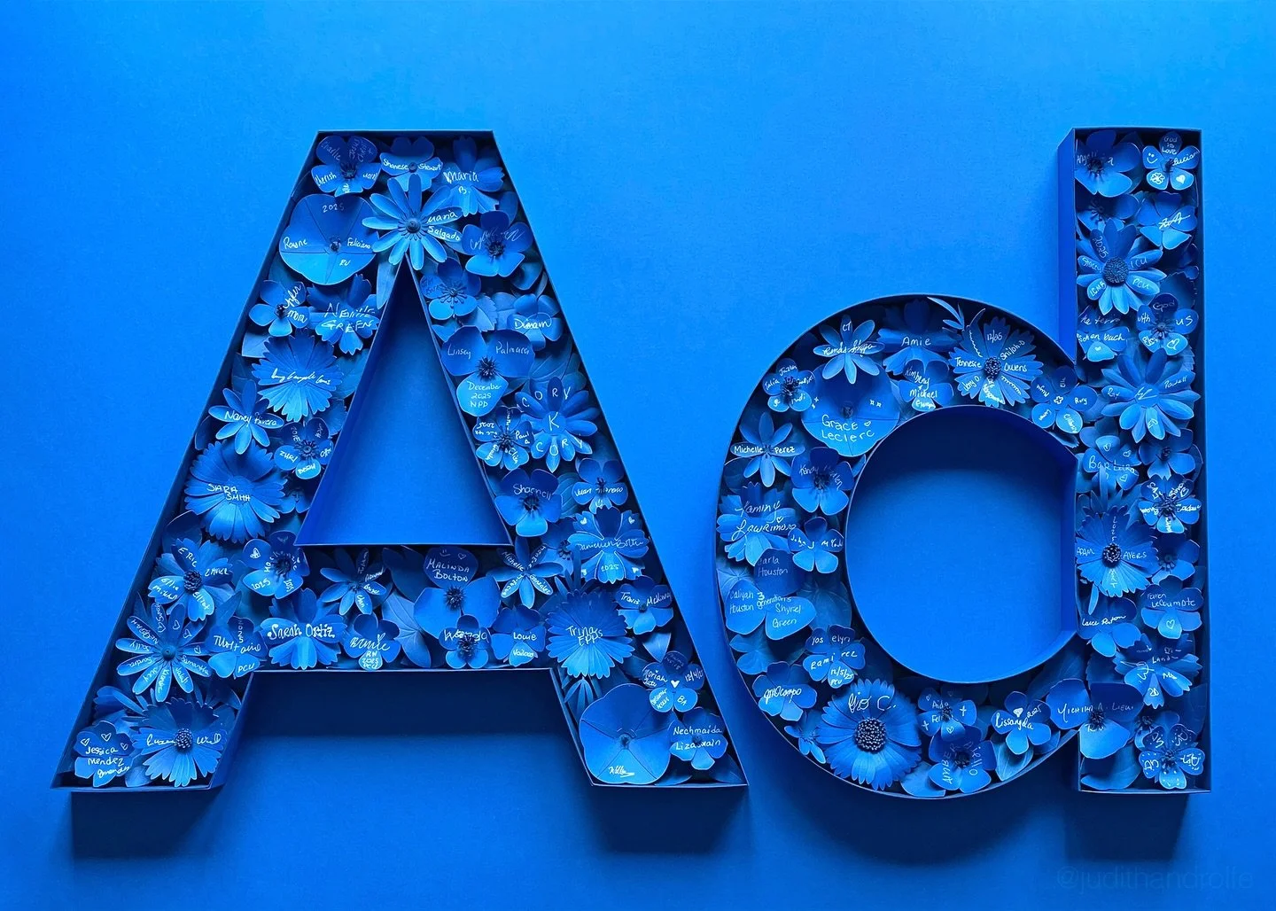 Their names are on the wall. 💙 
[Swipe to see installed photos.]
Before this sign was assembled and installed, the staff at AdventHealth Minneola did something special. They signed the paper flowers. Each petal holds a name. A note. A moment in time