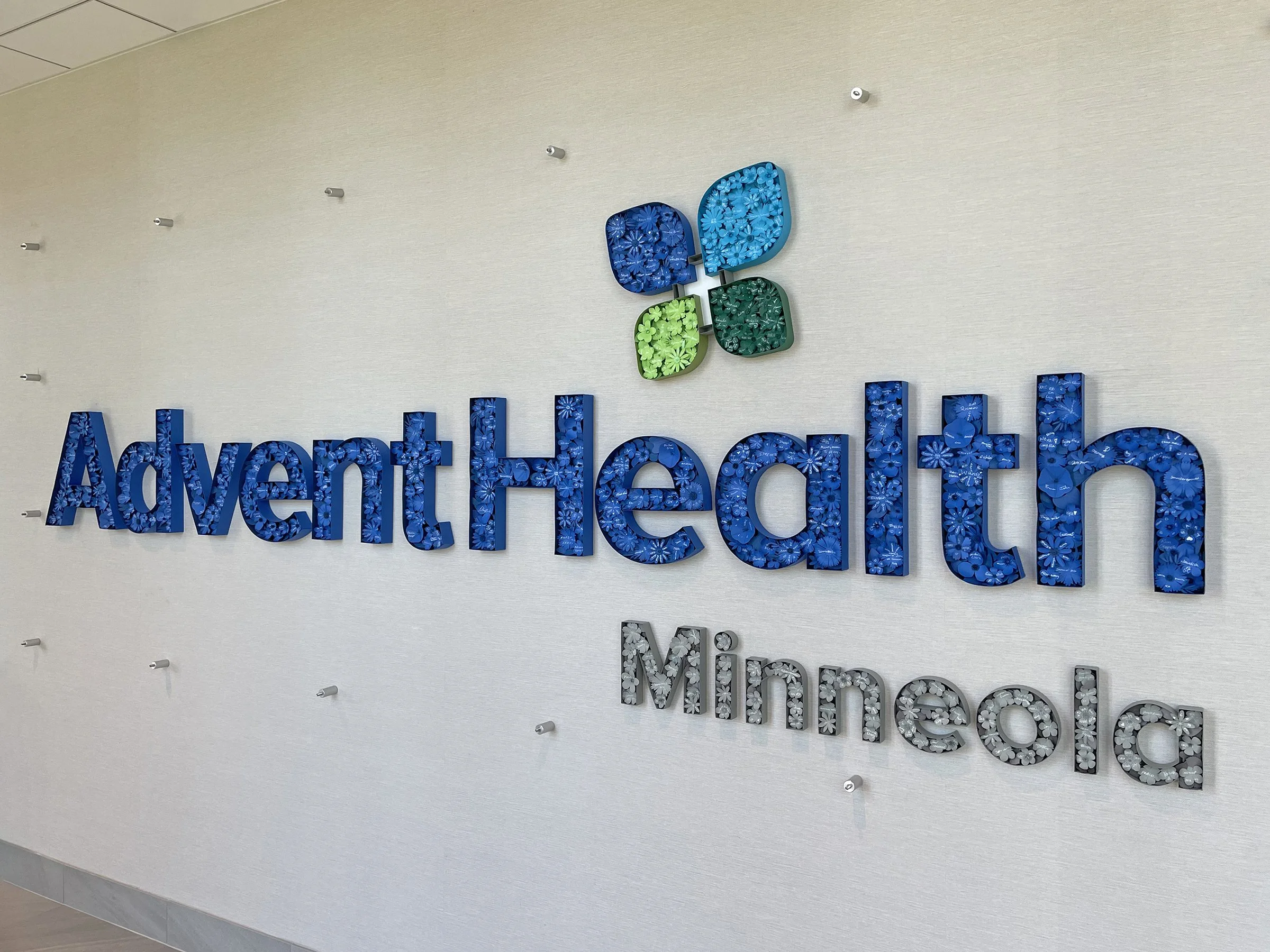 paper-signage_JUDiTH+ROLFE_AdventHealth-Minneola-installation1.jpg