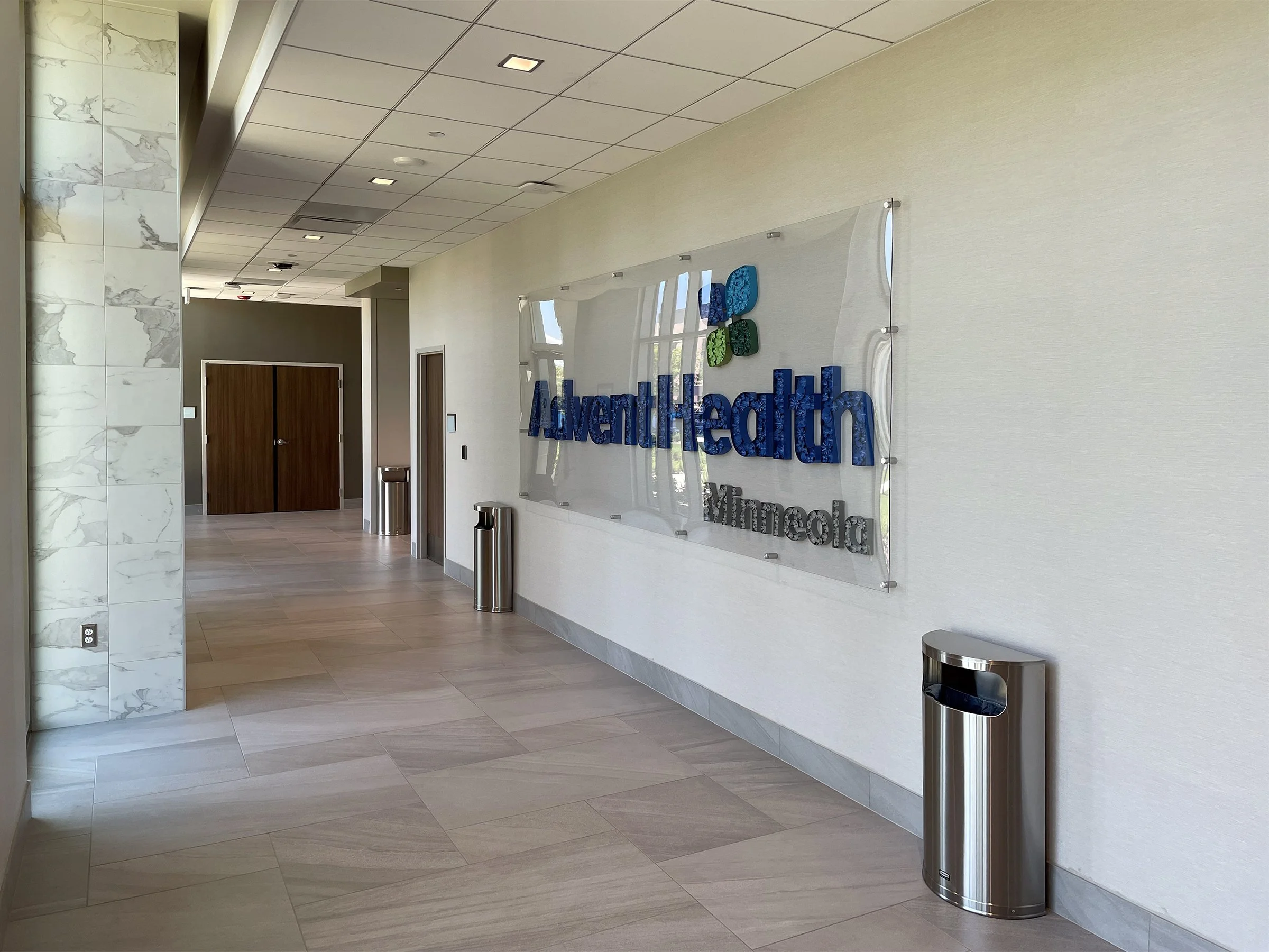 paper-signage_JUDiTH+ROLFE_AdventHealth-Minneola-installation3.jpg