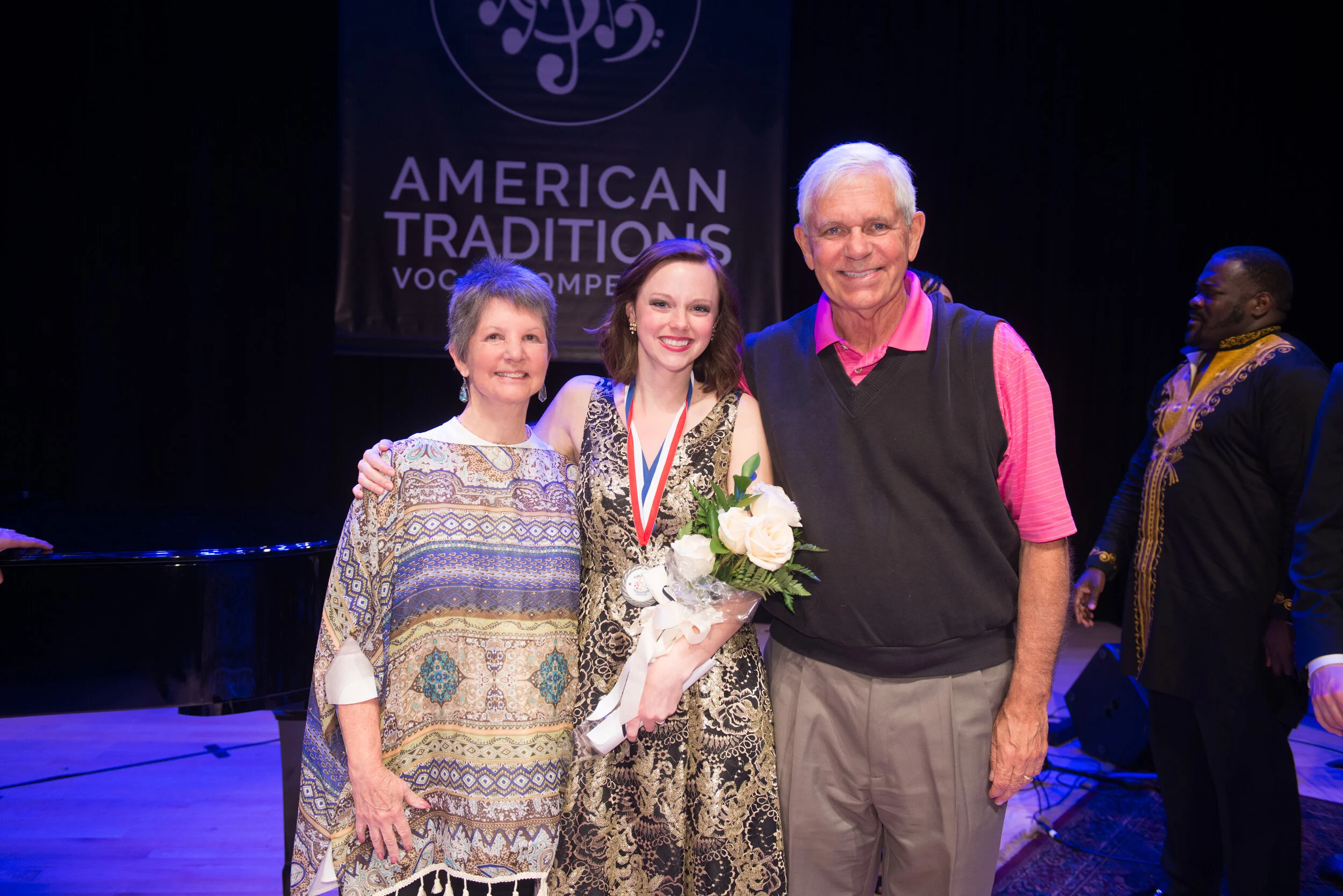 2019 Silver Medalist Emily Yocum Black and her sponsors, Melissa and Jim Emery.