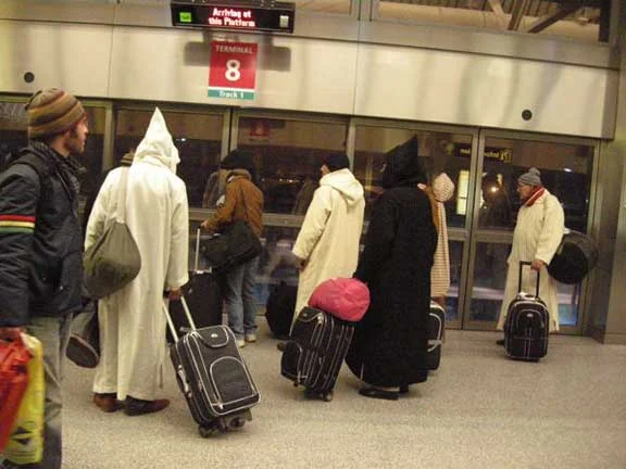 The Master Musicians of Jajouka board the Air Train in Rabat