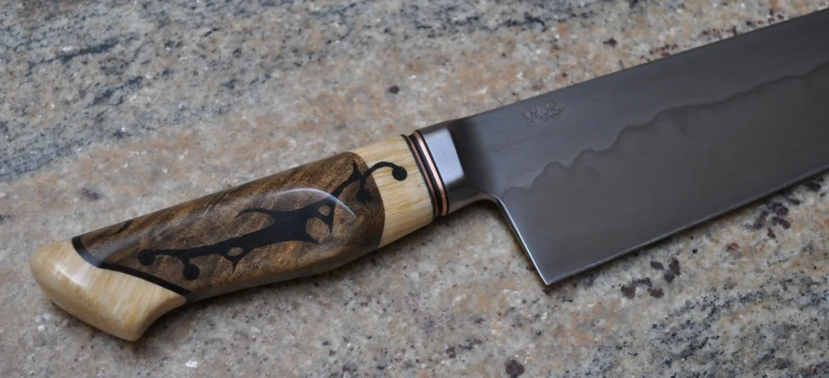 carved chef handle