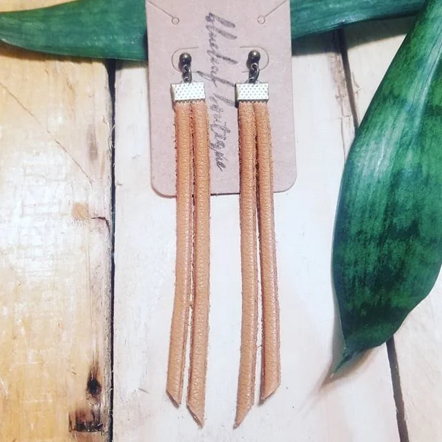 Long Leather Fringe on posts in Whiskey $26 with free delivery in Anchorage and the Valley. 
Shipping outside Alaska is available upon request. 
Comment &quot;sold&quot; and I will PM you to make arrangements.

#handmadeinalaska #handmadejewelry #lea