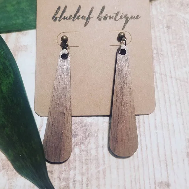 Simple walnut wood drop earrings on posts. $26 with free delivery in Anchorage and the Valley. 
Shipping outside Alaska is available upon request. 
Comment &quot;sold&quot; and I will PM you to make arrangements.

#handmadeinalaska #handmadejewelry #
