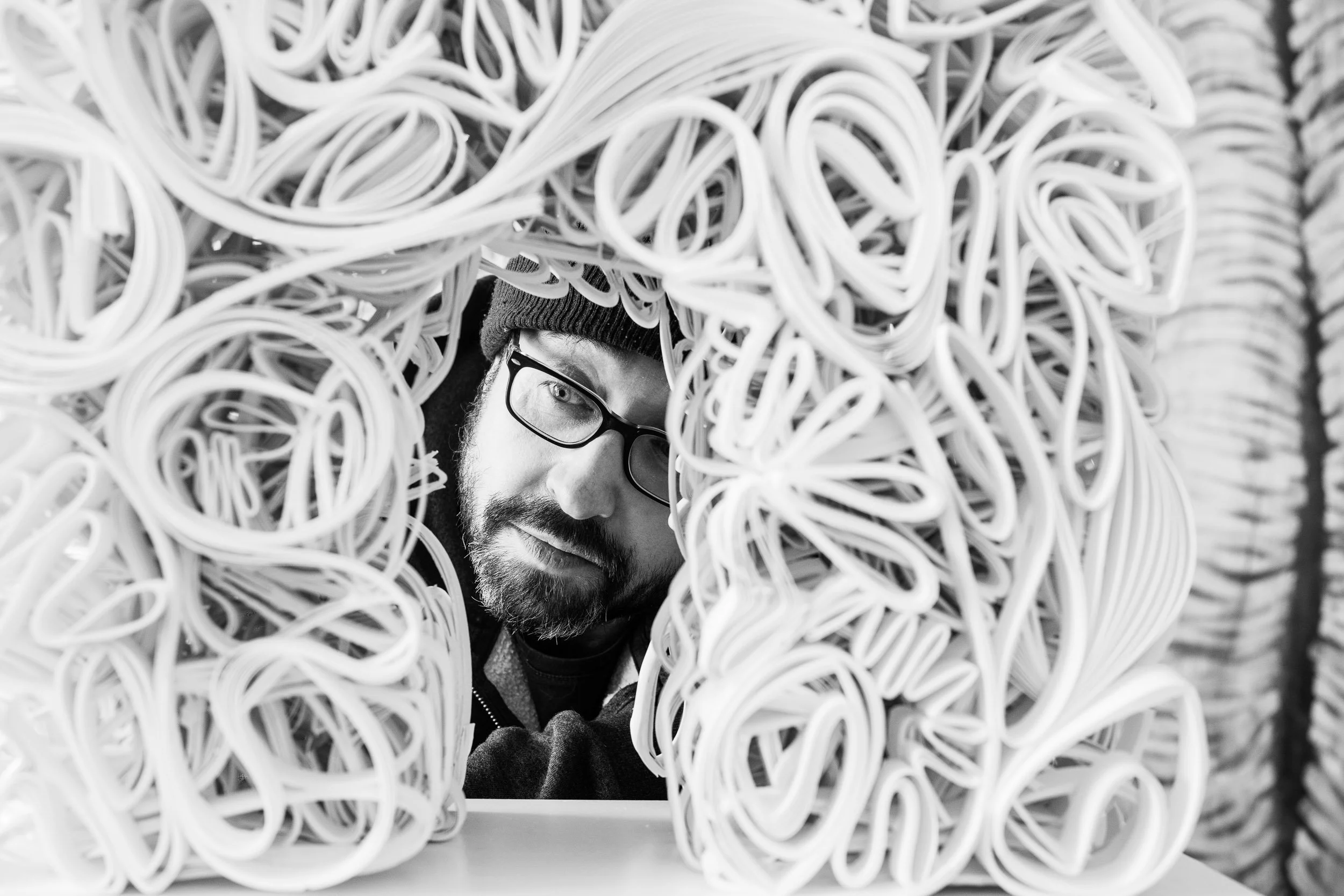 David M. Moinot, paper, portraits and a rotating sculpture
