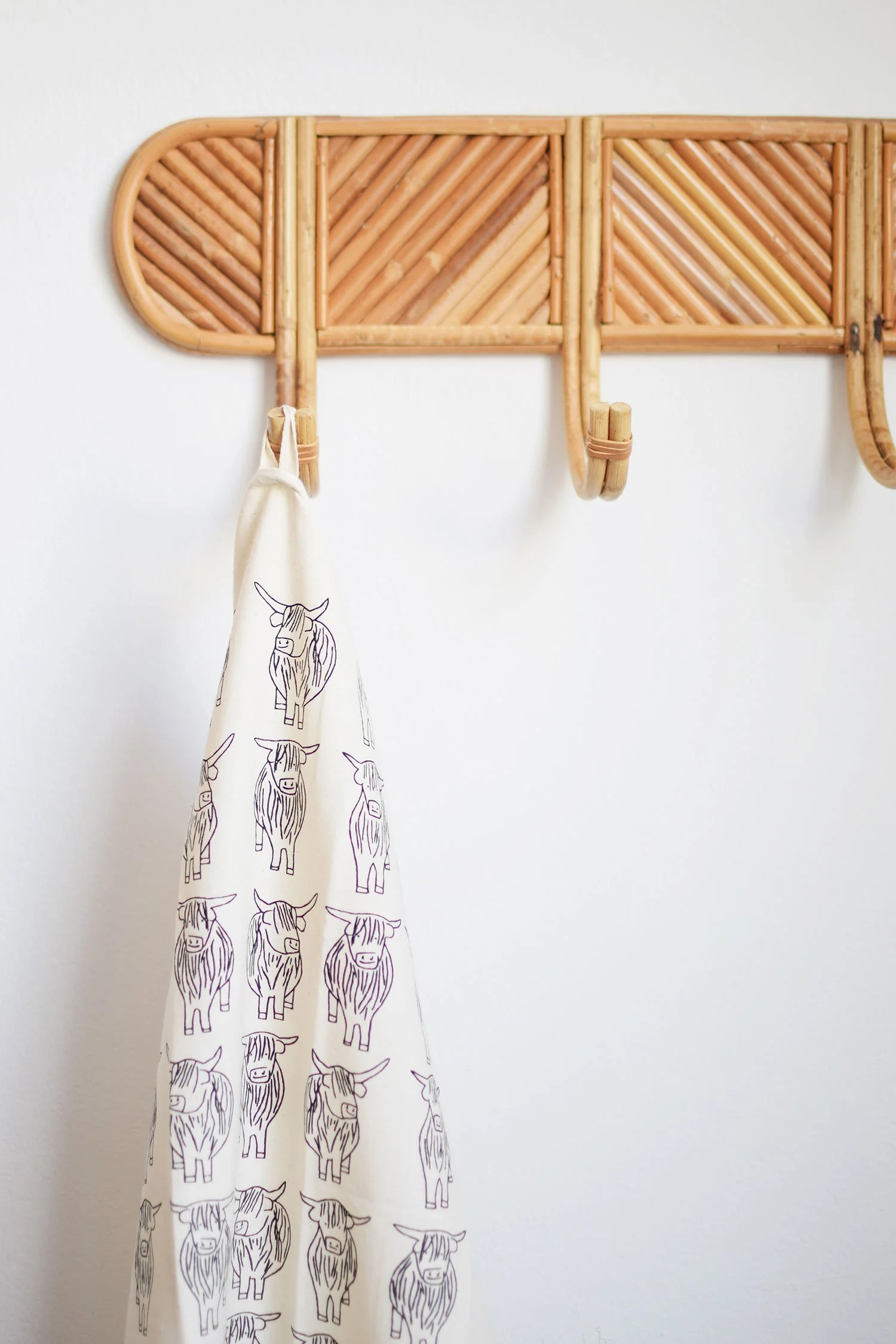 Highland cows tea towel designed by local Edinburgh artist Sally Fisher