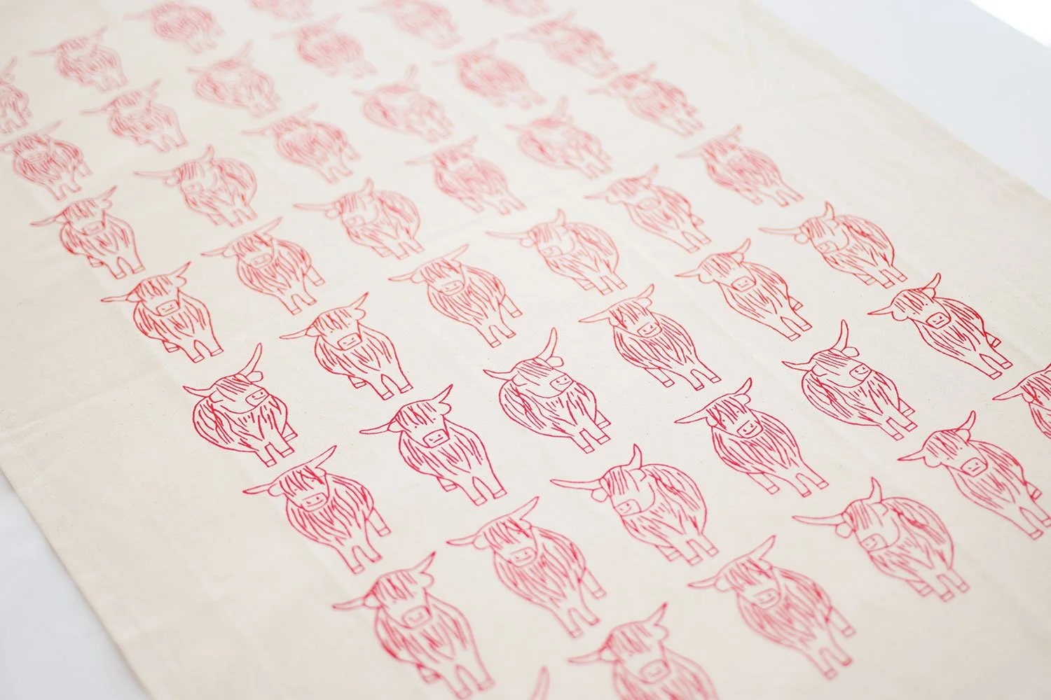 Red highland cows organic cotton tea towel by local edinburgh artist