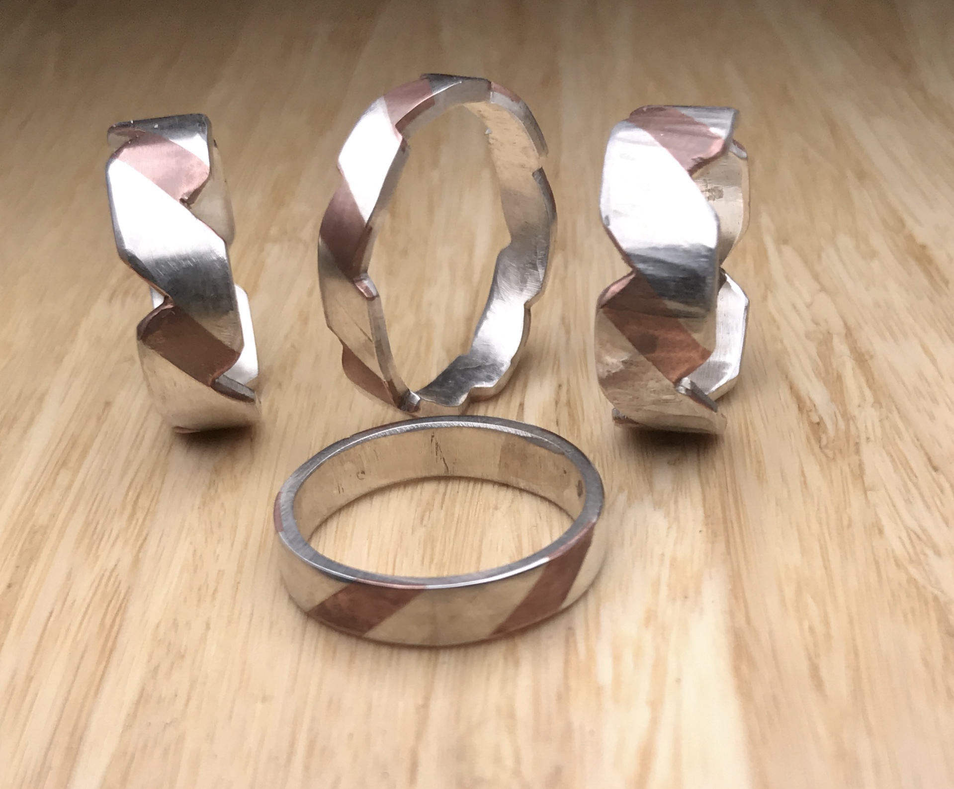 Marriage-of-metal rings with diagonal accents