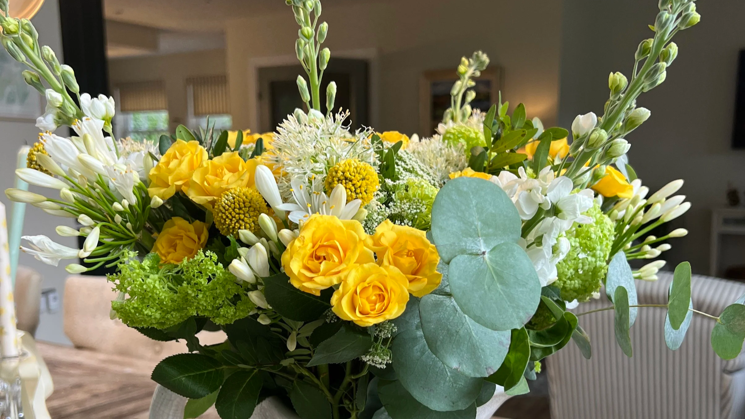 Yellow and white flower bouquet emulating summer.