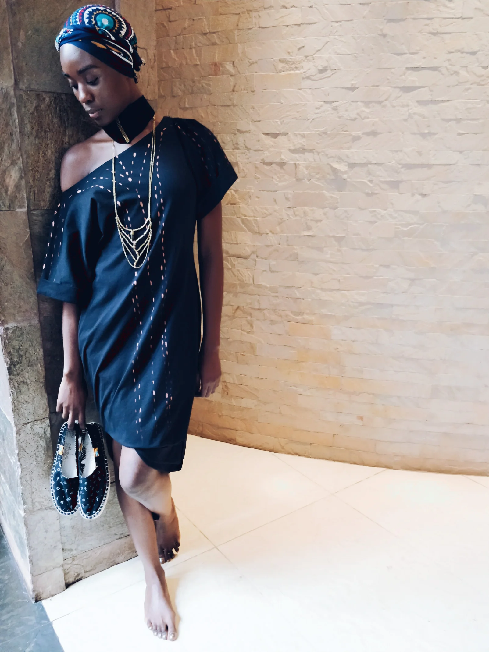 Handpainted jersey drape dress, $75 | Beaded collar, $150 | Green tourmaline layers, $105