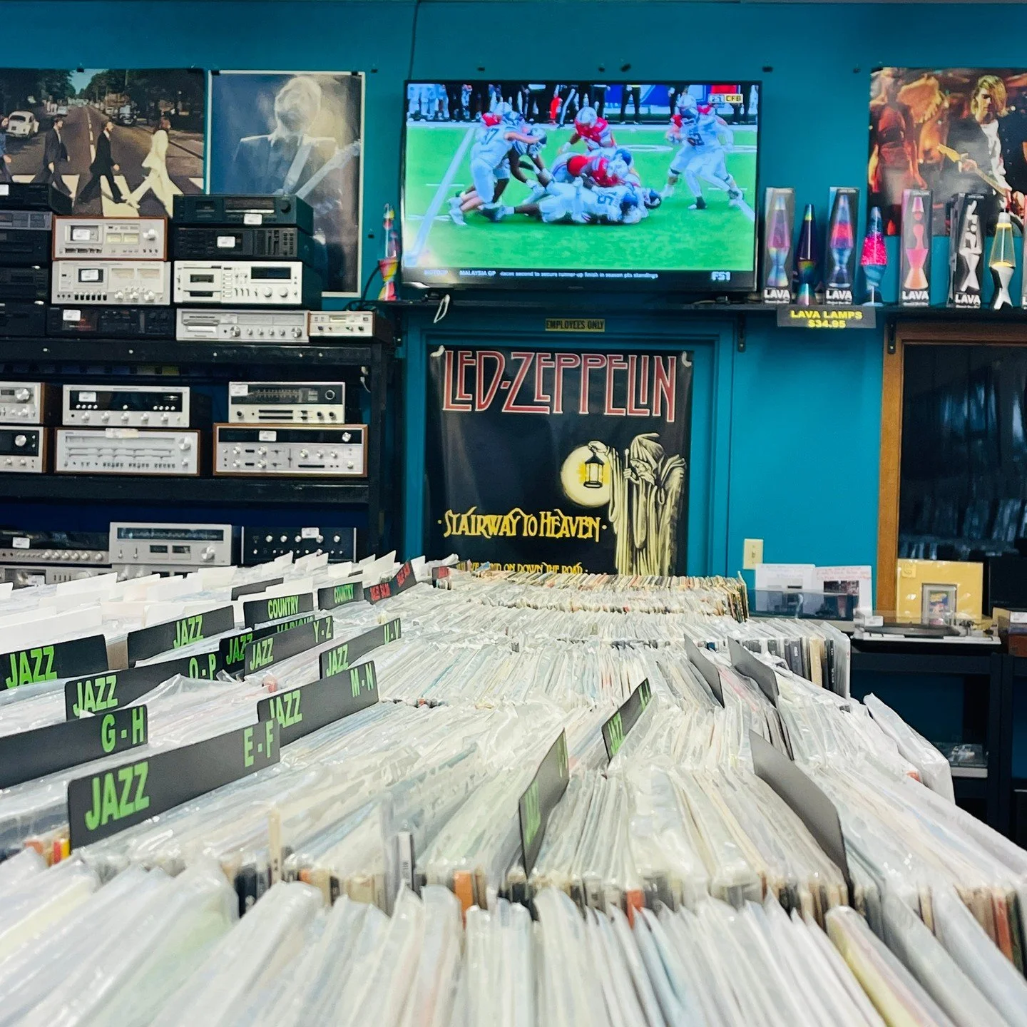 Come on down and grab some new tunes and keep an eye on the huskers while you shop!