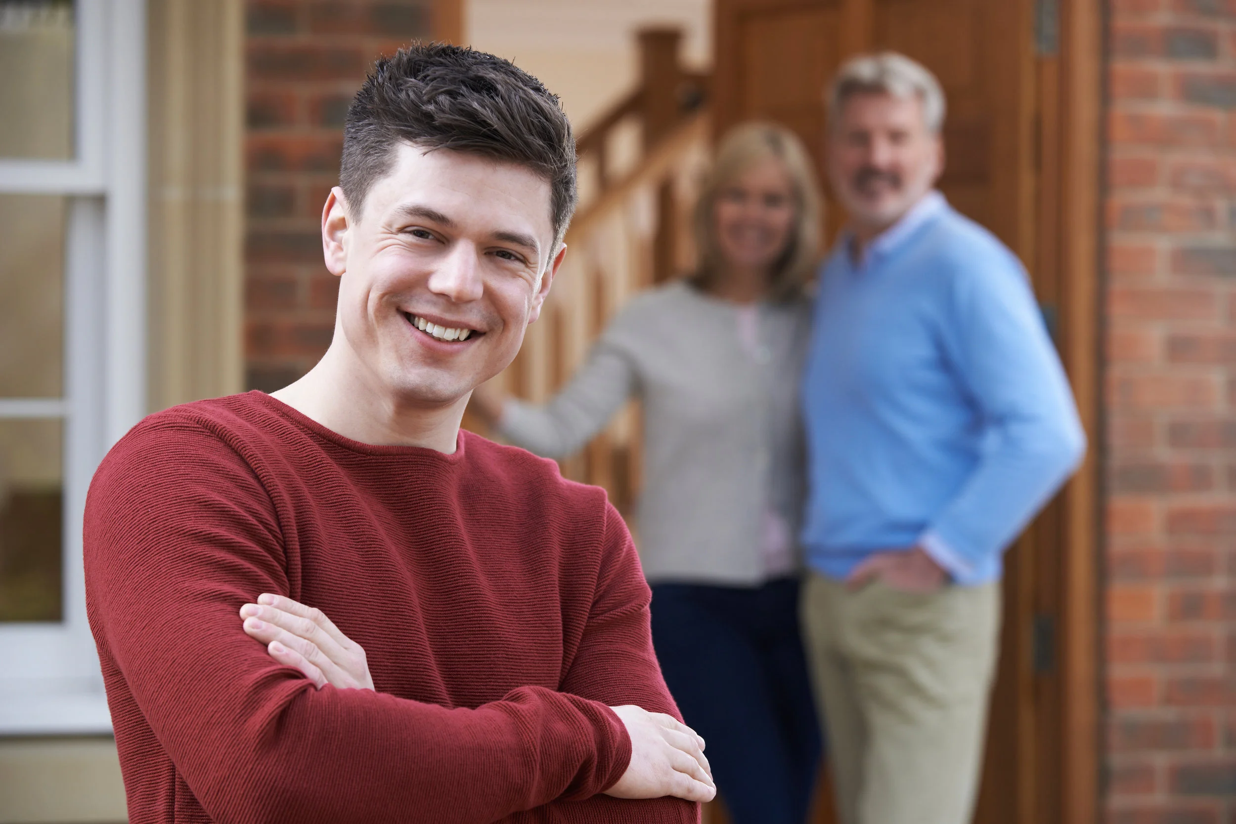 happy boy and parents.jpeg