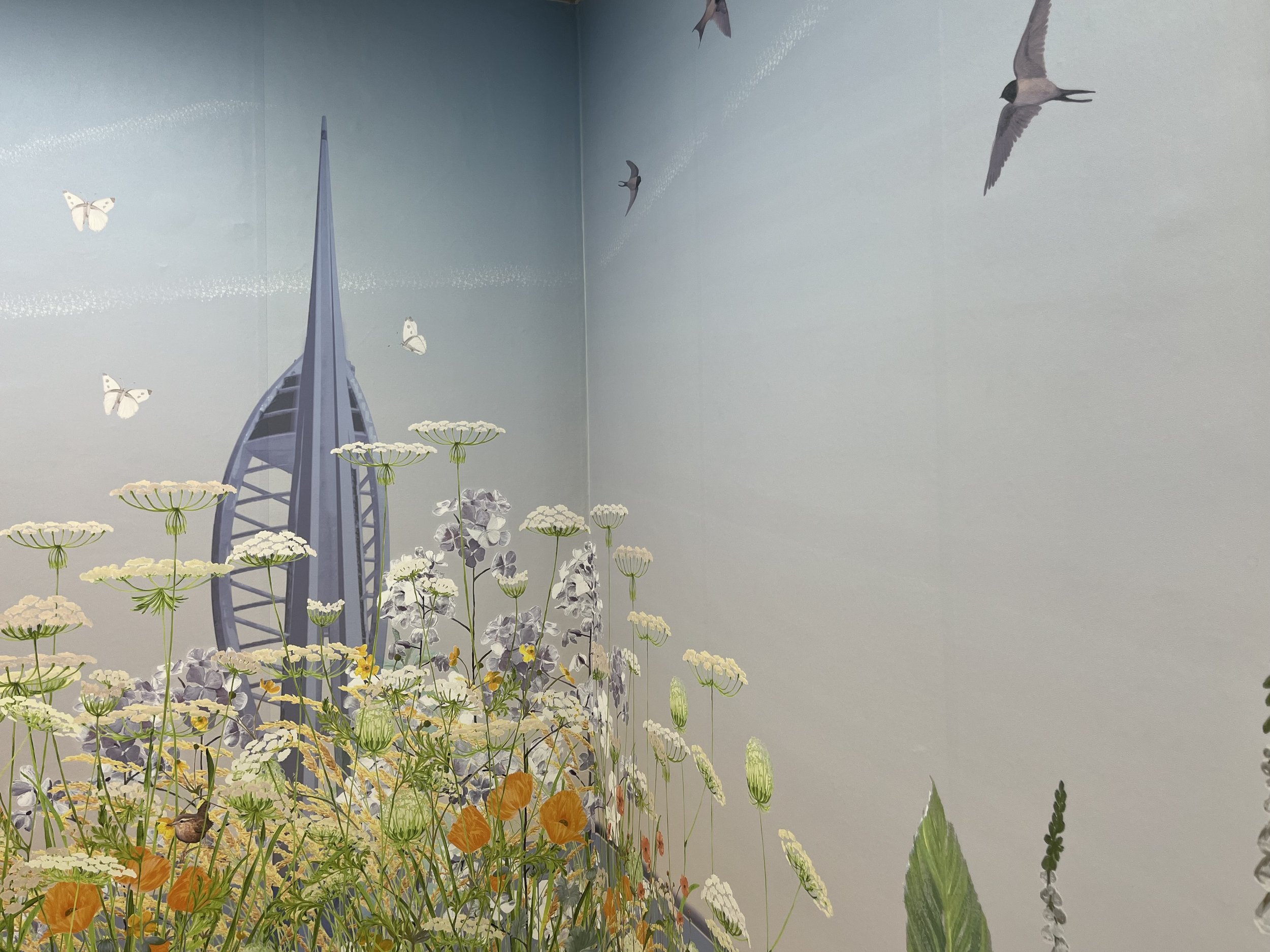 Detail of a botanical biophilic mural in a third space community centre