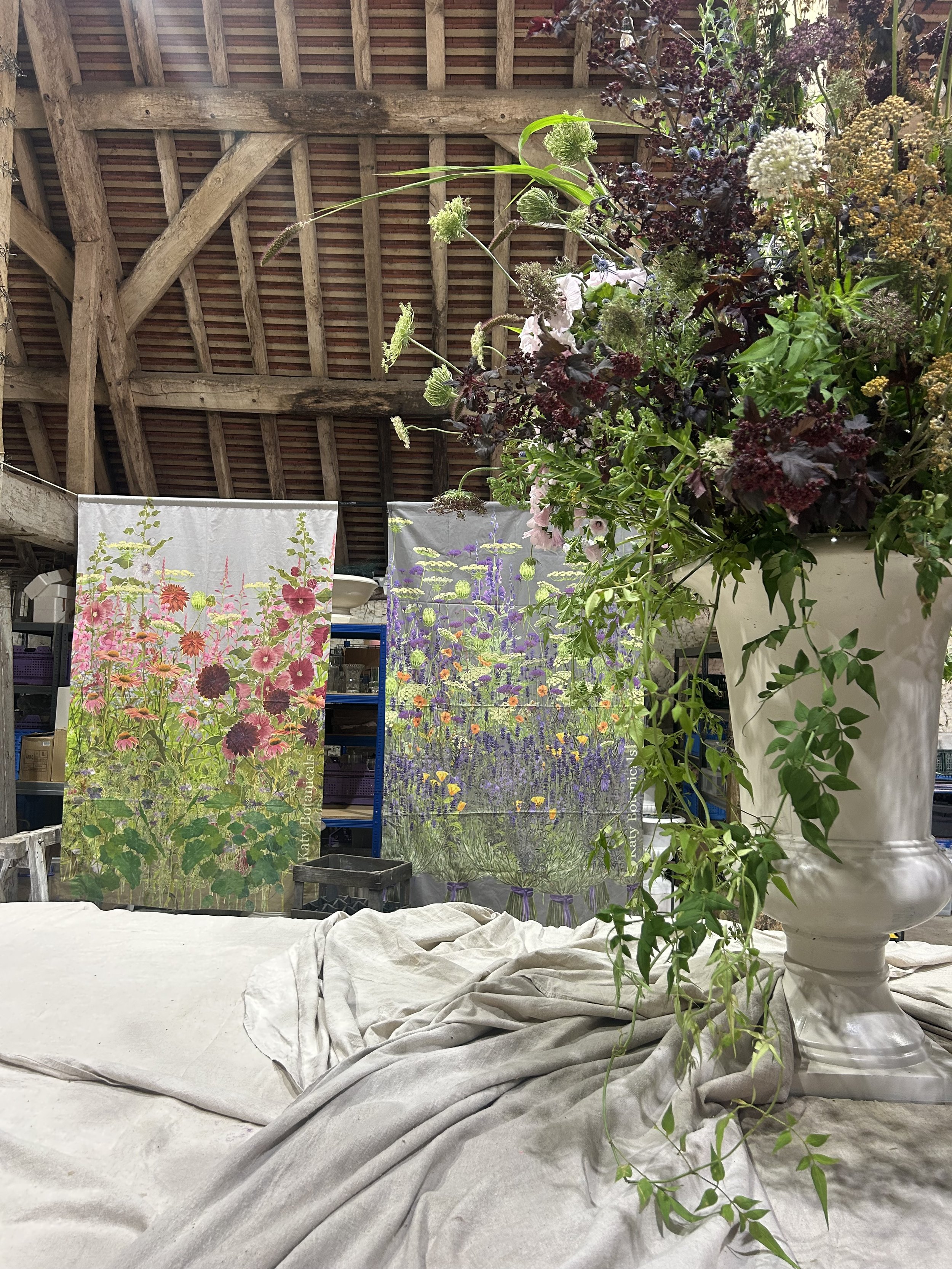 Katy Botanicals flags being exhibited at Featherstone Flowers Tithe barn