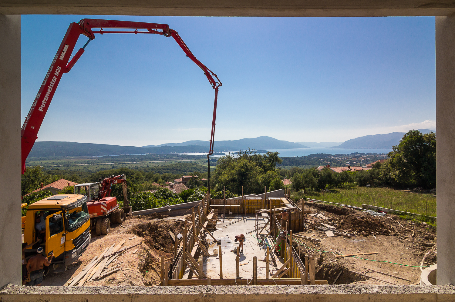 Pool construction as seen from one - at the time future - apartment