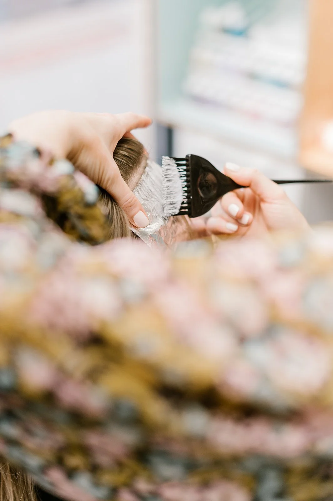 Foil highlighting technique used to create dimensional hair color.