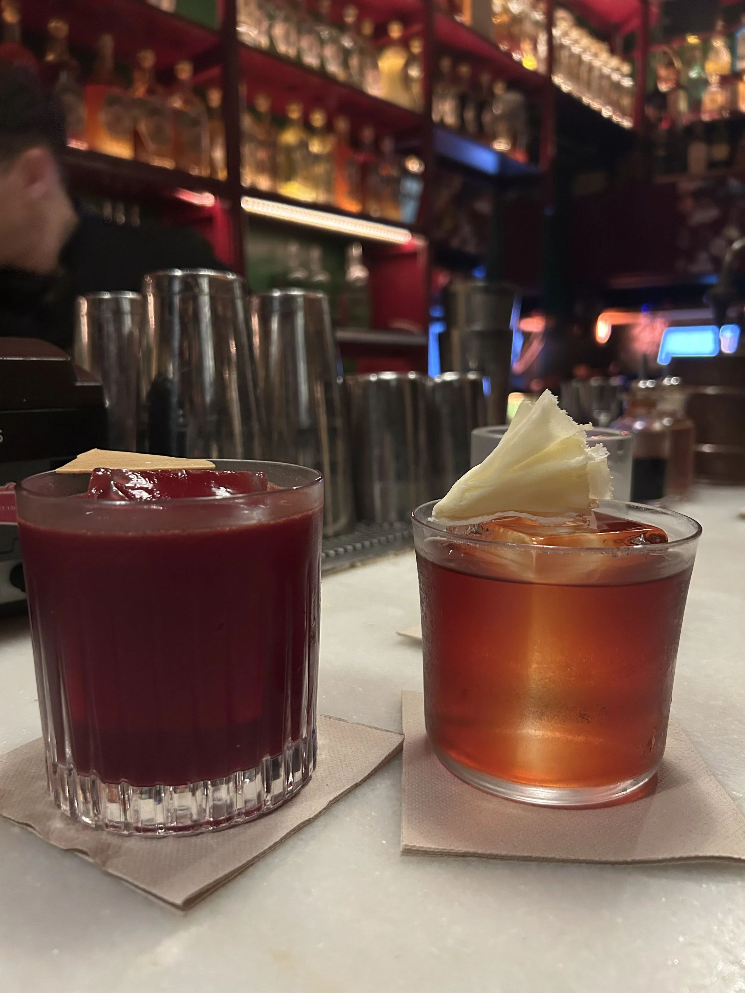 two craft cocktails served at Dr. Stravinsky bar in Barcelona