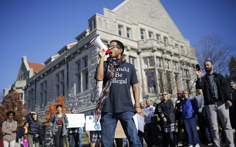 Willy Palomo leading a rally for sanctuary campus in November 2016.