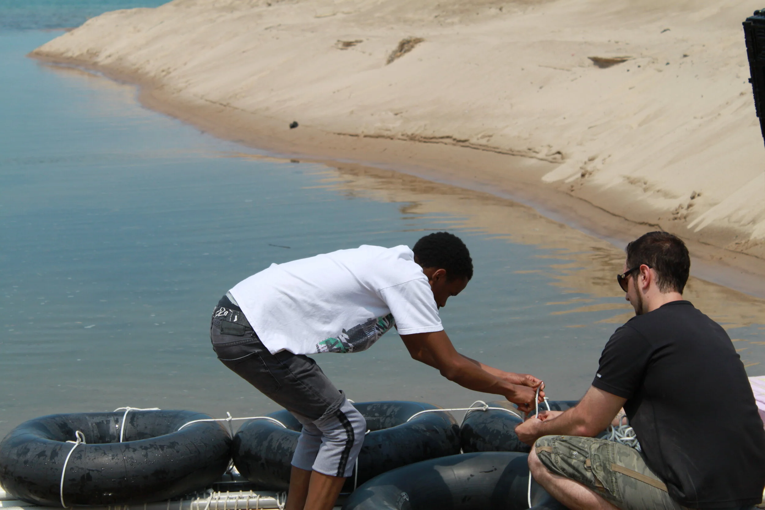 Tying Golda's Tires.JPG