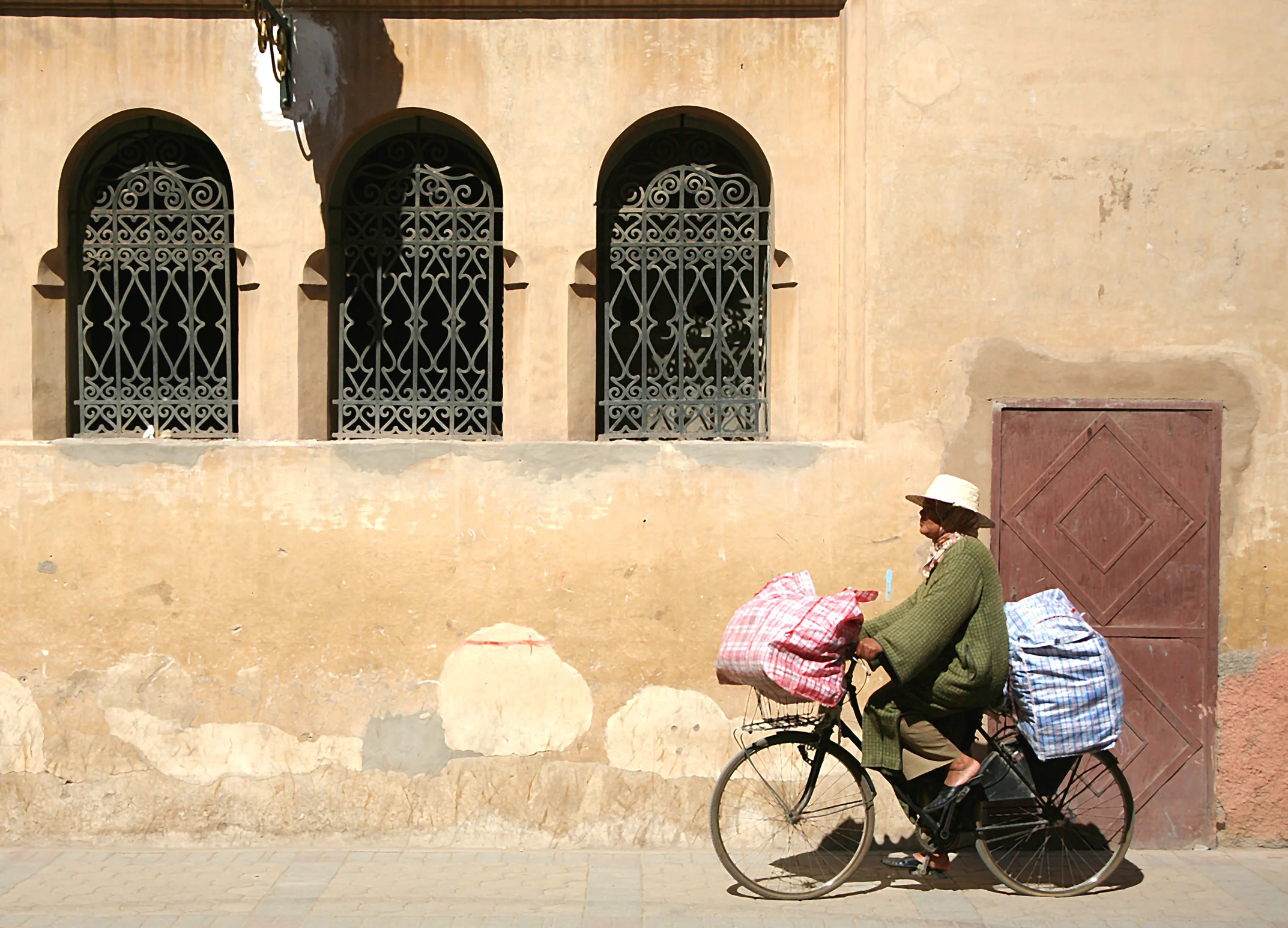  Bicyclist and Arched Windows; Marrakech, Morocco 