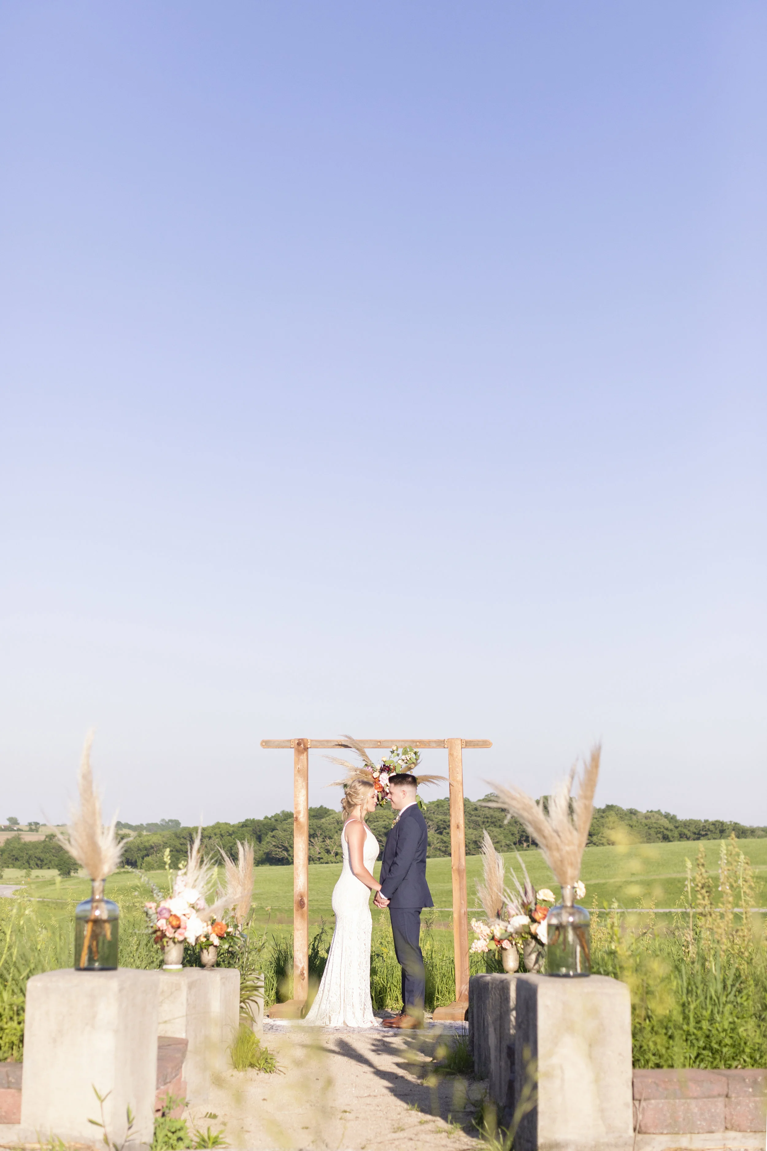 Flowers & Arch: @thistles_pella Photography: @heatherferreria Hair: @alstreet.rmh Make-up: @lc.henderson Calligraphy: @lydiabandstra Table, Rug, Chairs: @pellarental Macrame: @kristajo60